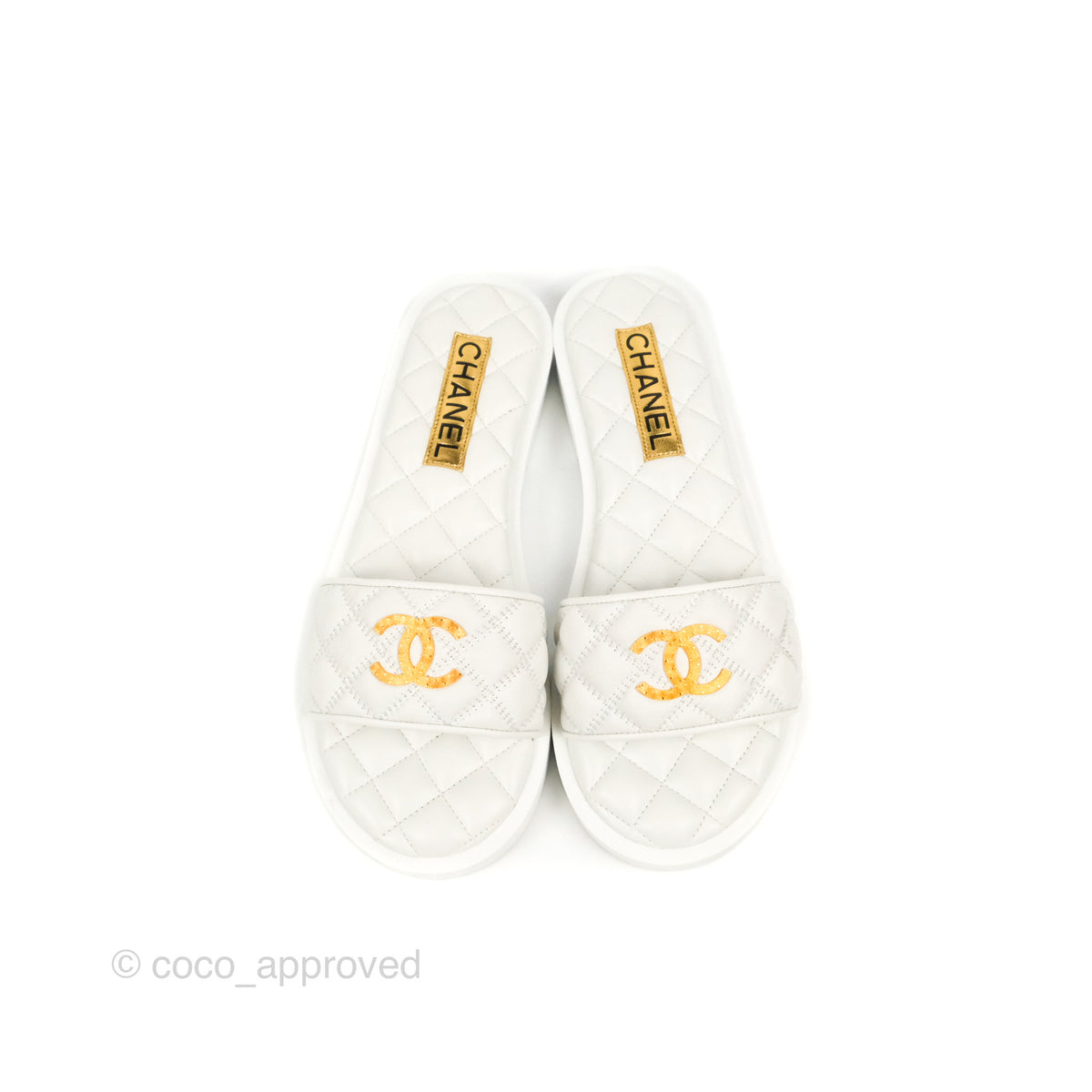 Chanel on sale slippers white