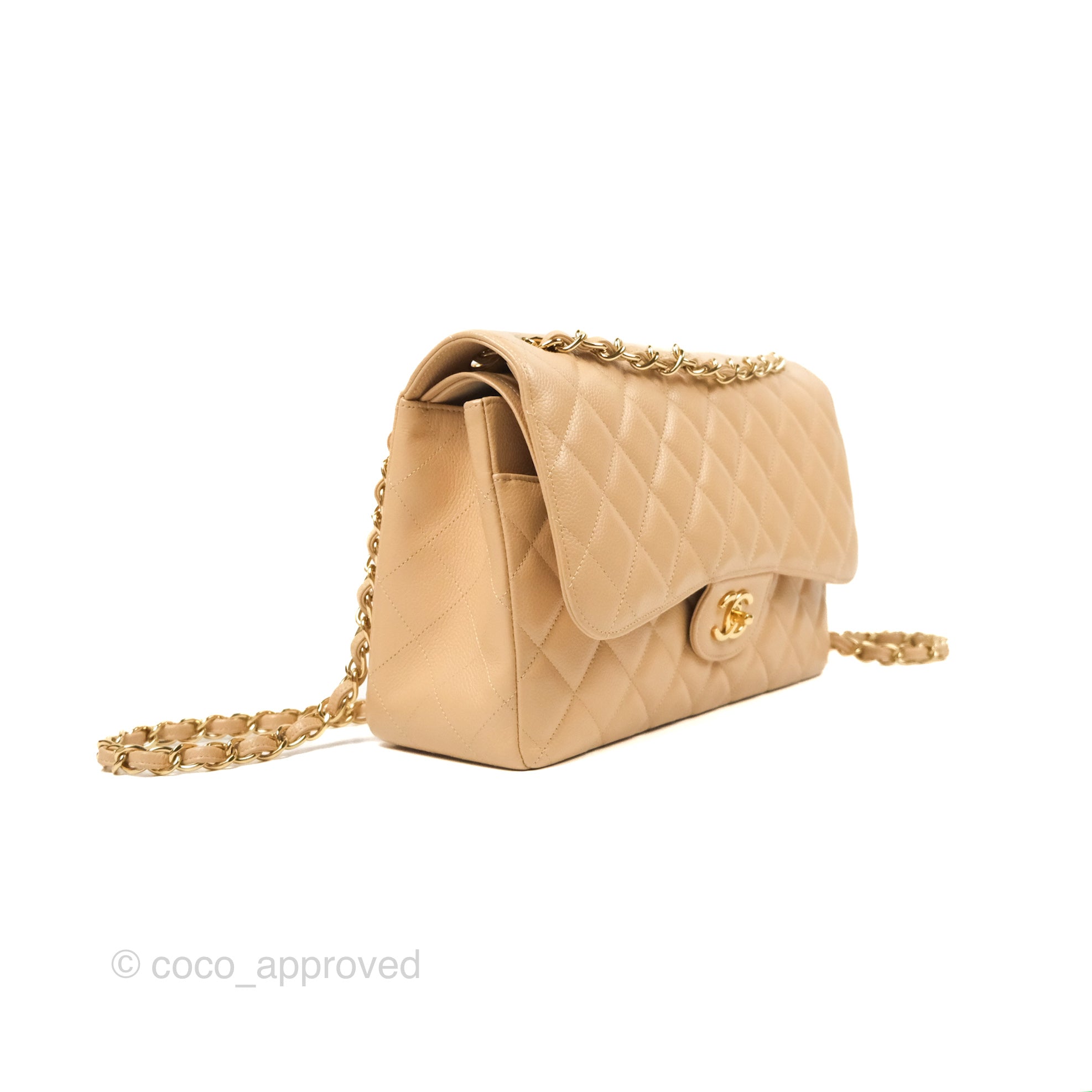 Chanel jumbo beige store caviar with gold hardware