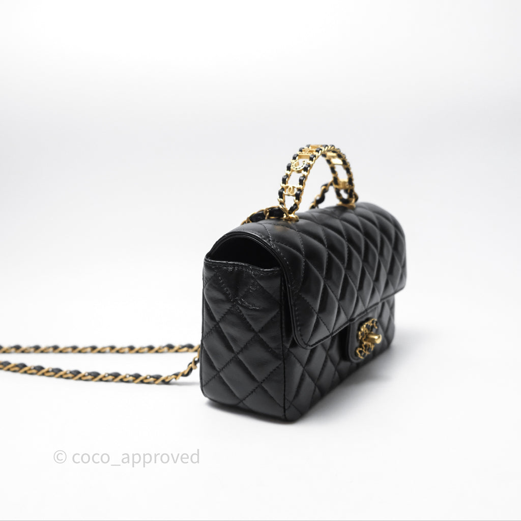 Chanel Flap Bag with Crystal Logo Top Handle Black Lambskin Aged Gold Hardware