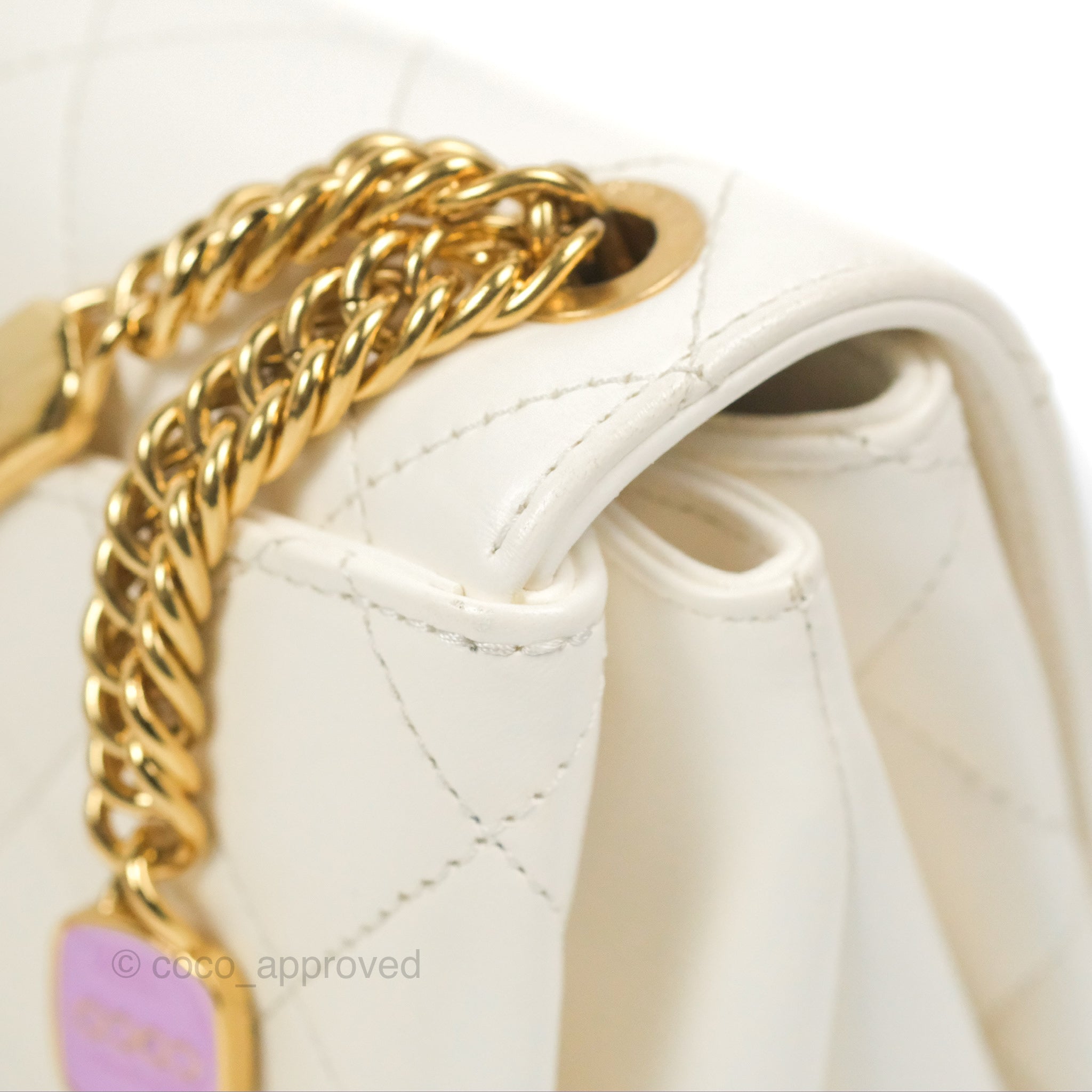 white chanel bag with gold chain