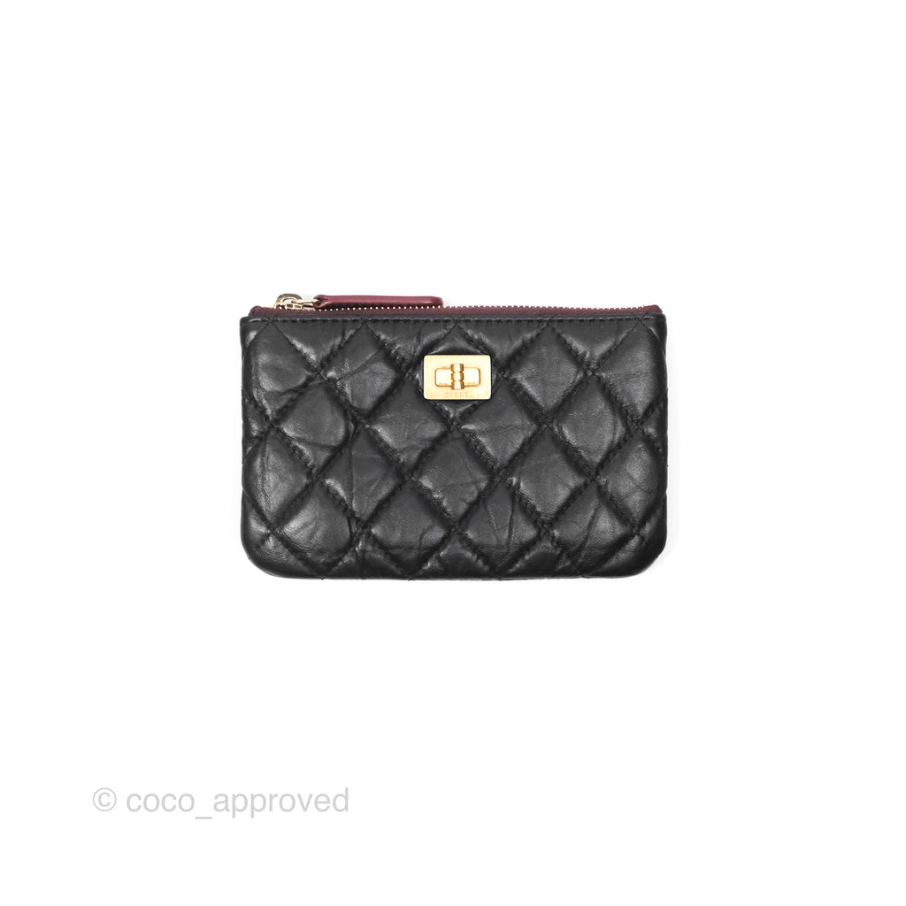 Chanel Quilted Mini Reissue O Case Black Calfskin Aged Gold Hardware