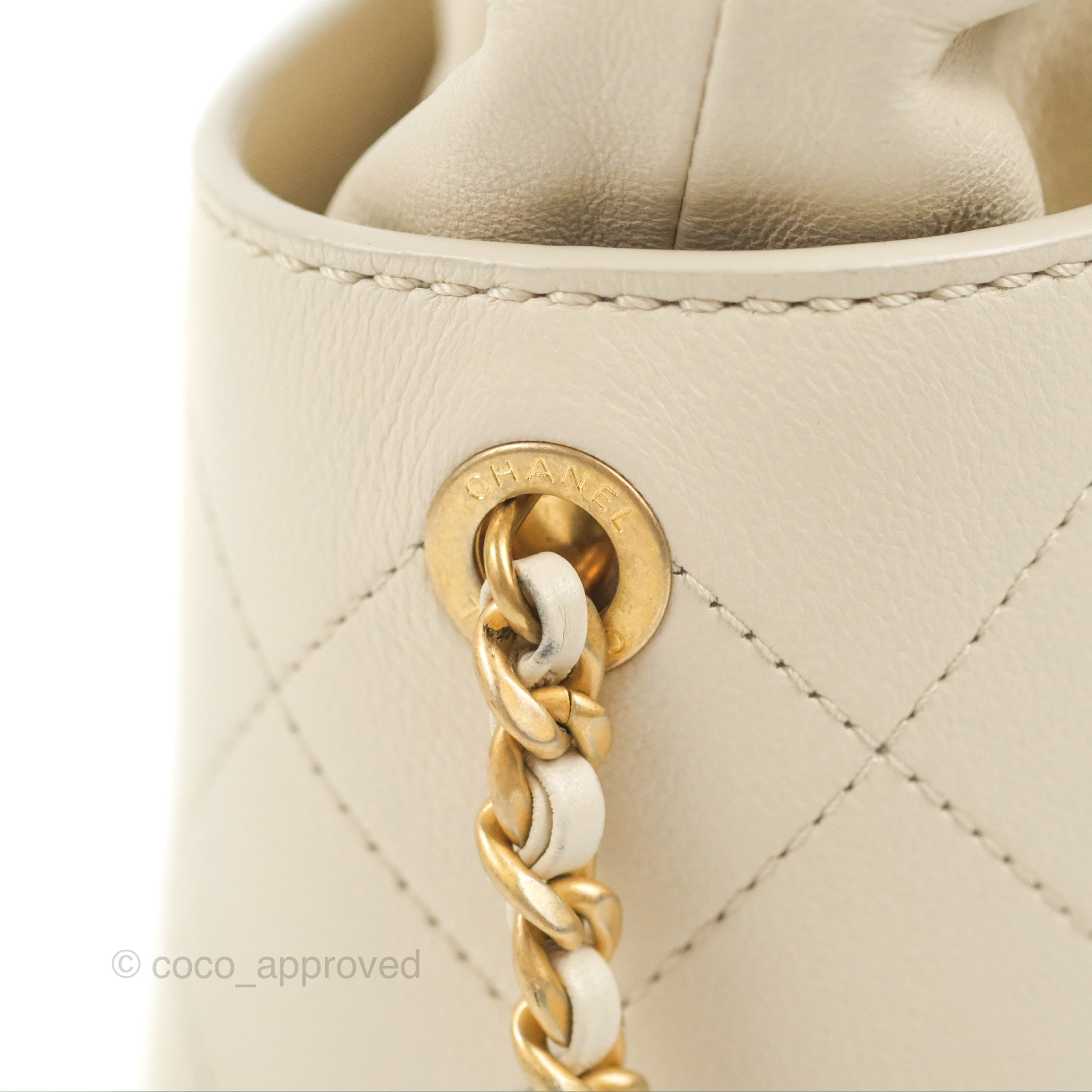 Chanel Quilted Drawstring Bucket Bag Ivory Lambskin Aged Gold Hardware – Coco  Approved Studio