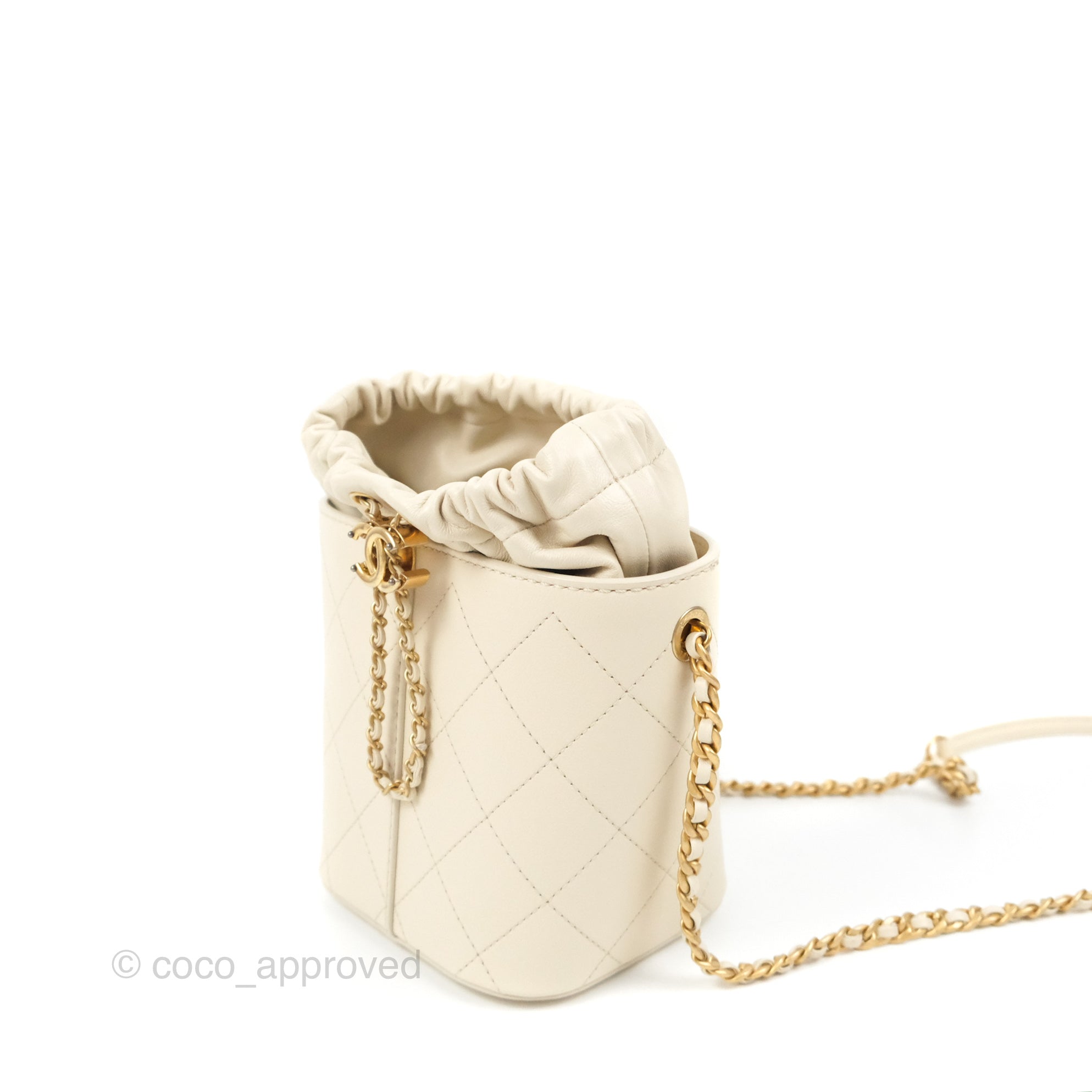 Chanel Quilted Drawstring Bucket Bag Ivory Lambskin Aged Gold
