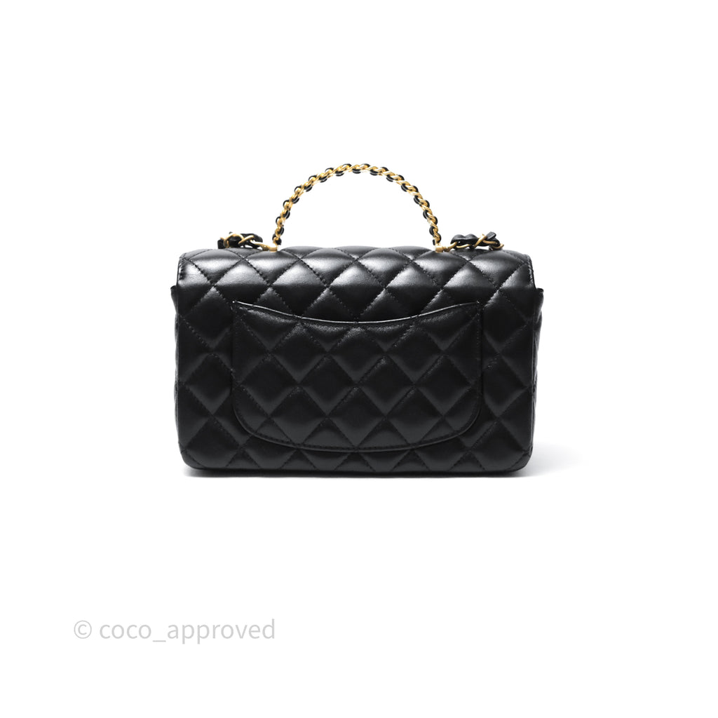 Chanel Flap Bag with Crystal Logo Top Handle Black Lambskin Aged Gold Hardware