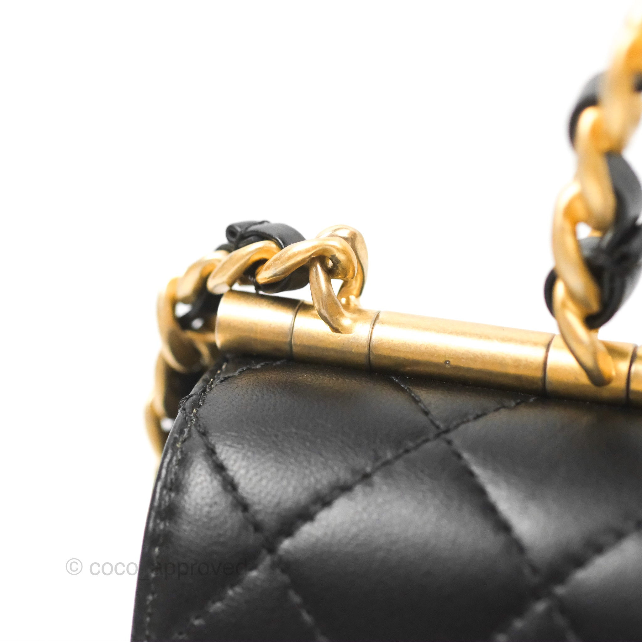 Chanel bag with hot sale gold plate on top