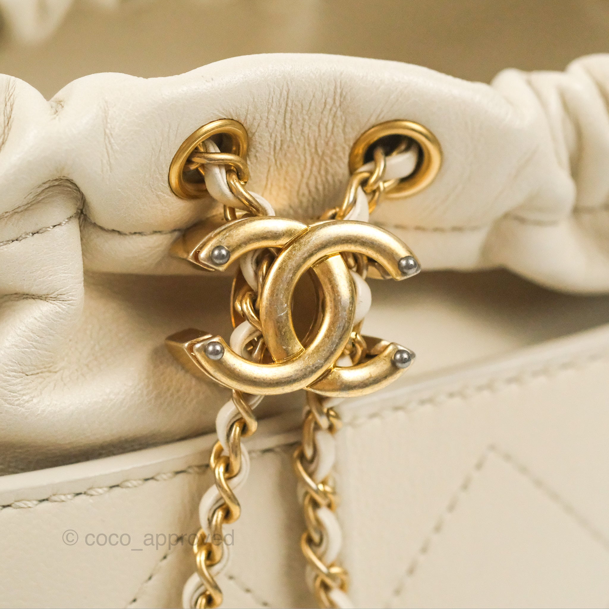 Chanel Quilted Drawstring Bucket Bag Ivory Lambskin Aged Gold Hardware –  Coco Approved Studio