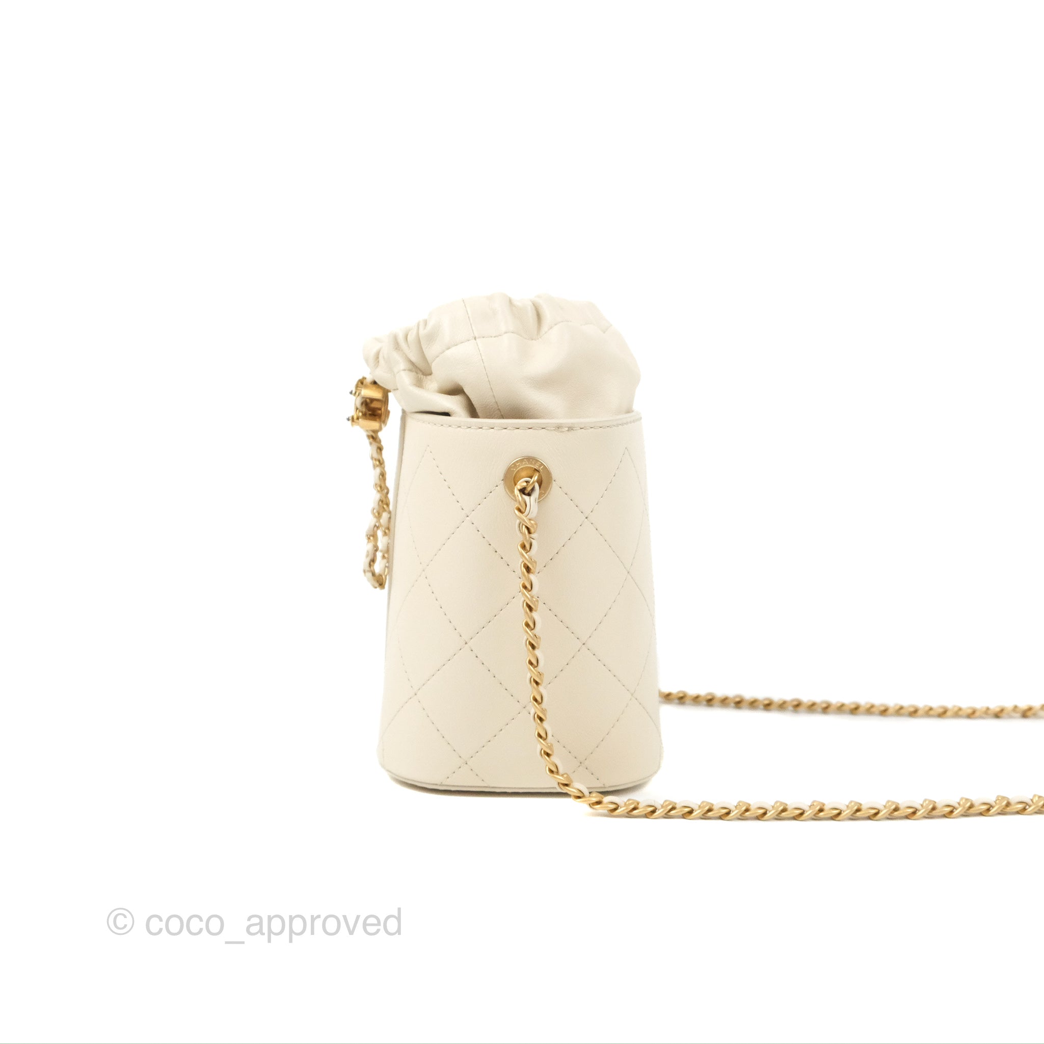 Chanel Quilted Drawstring Bucket Bag Ivory Lambskin Aged Gold Hardware –  Coco Approved Studio