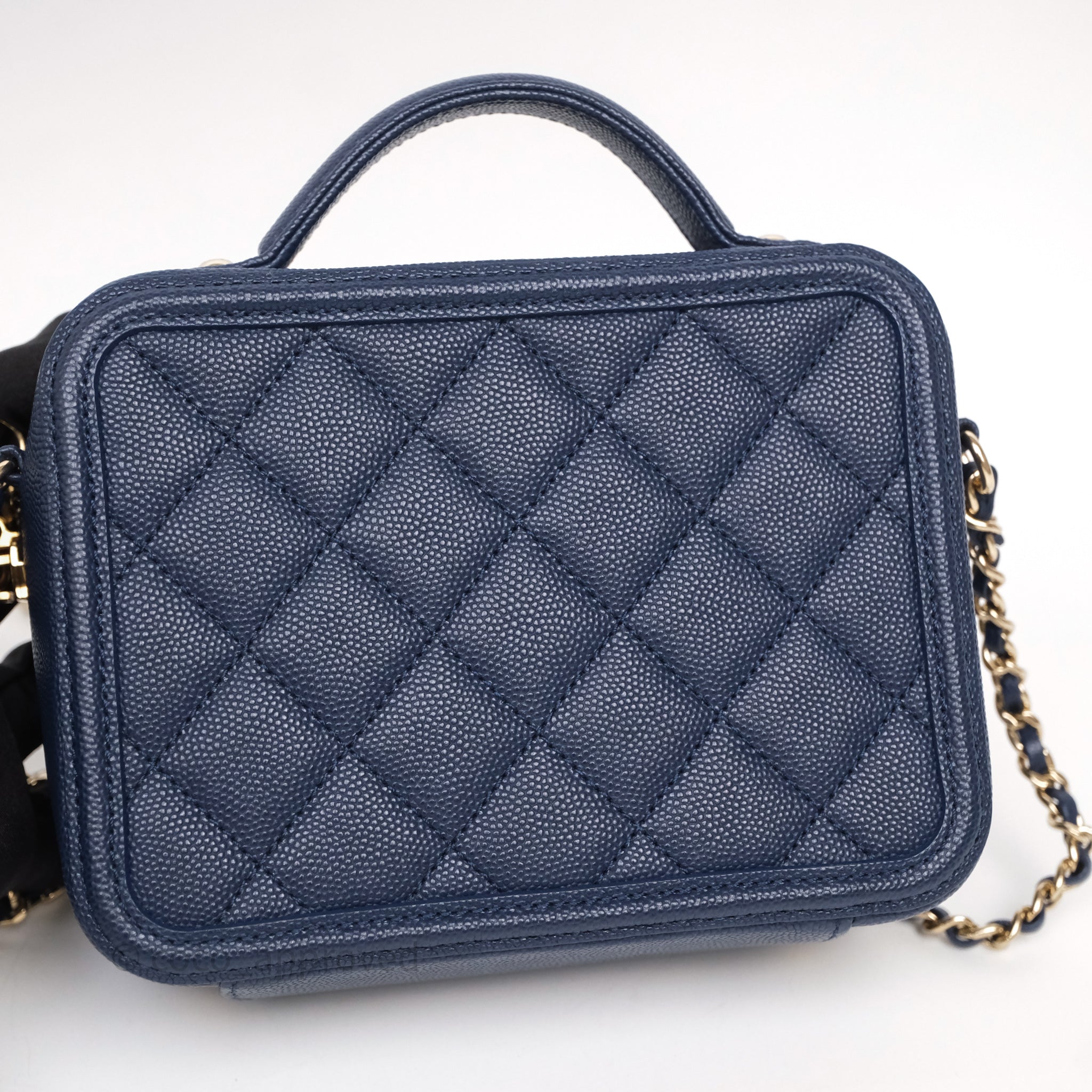 Chanel Quilted Small CC Filigree Vanity Case Navy Caviar Gold