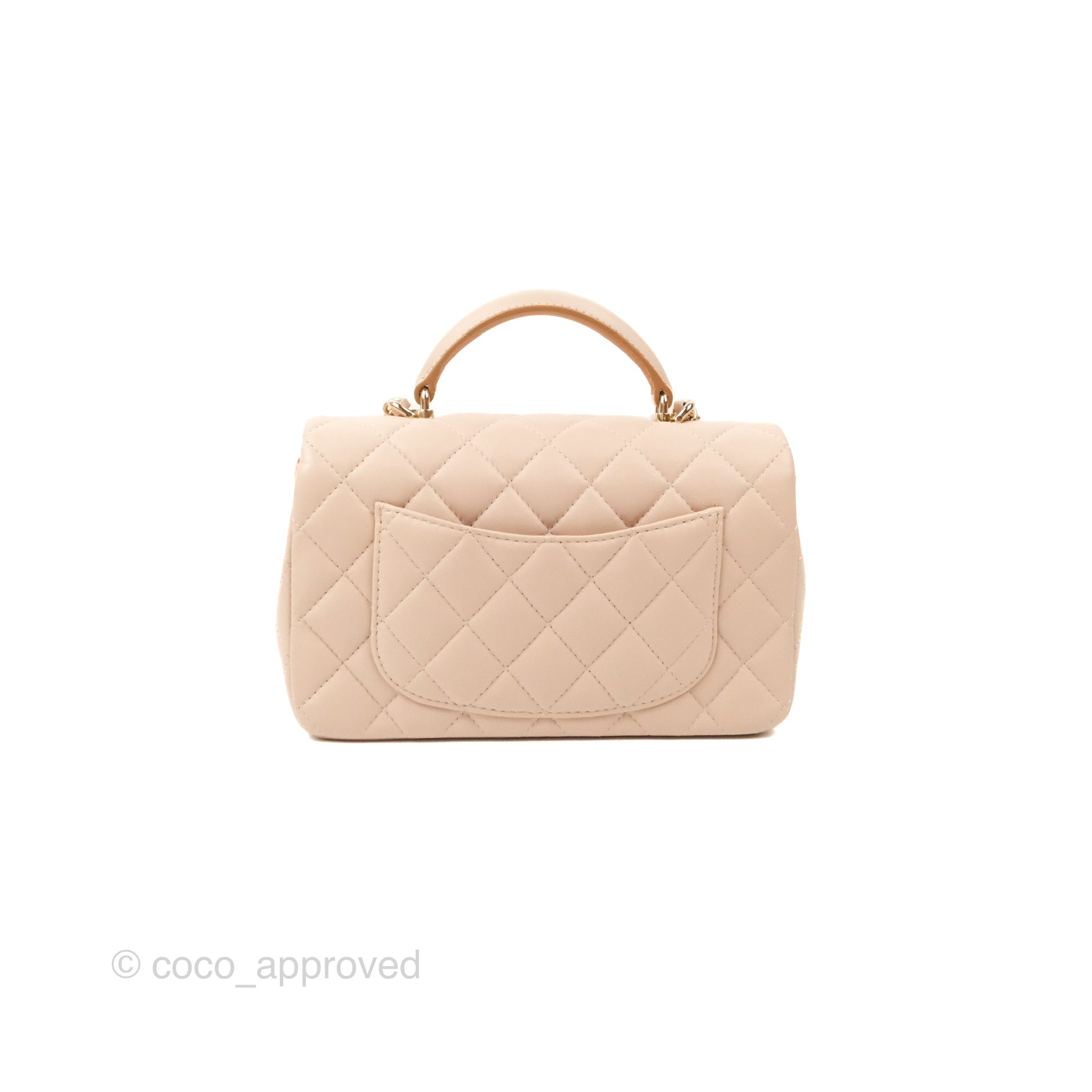 Sold at Auction: A MINI FUR BAG BY CHANEL