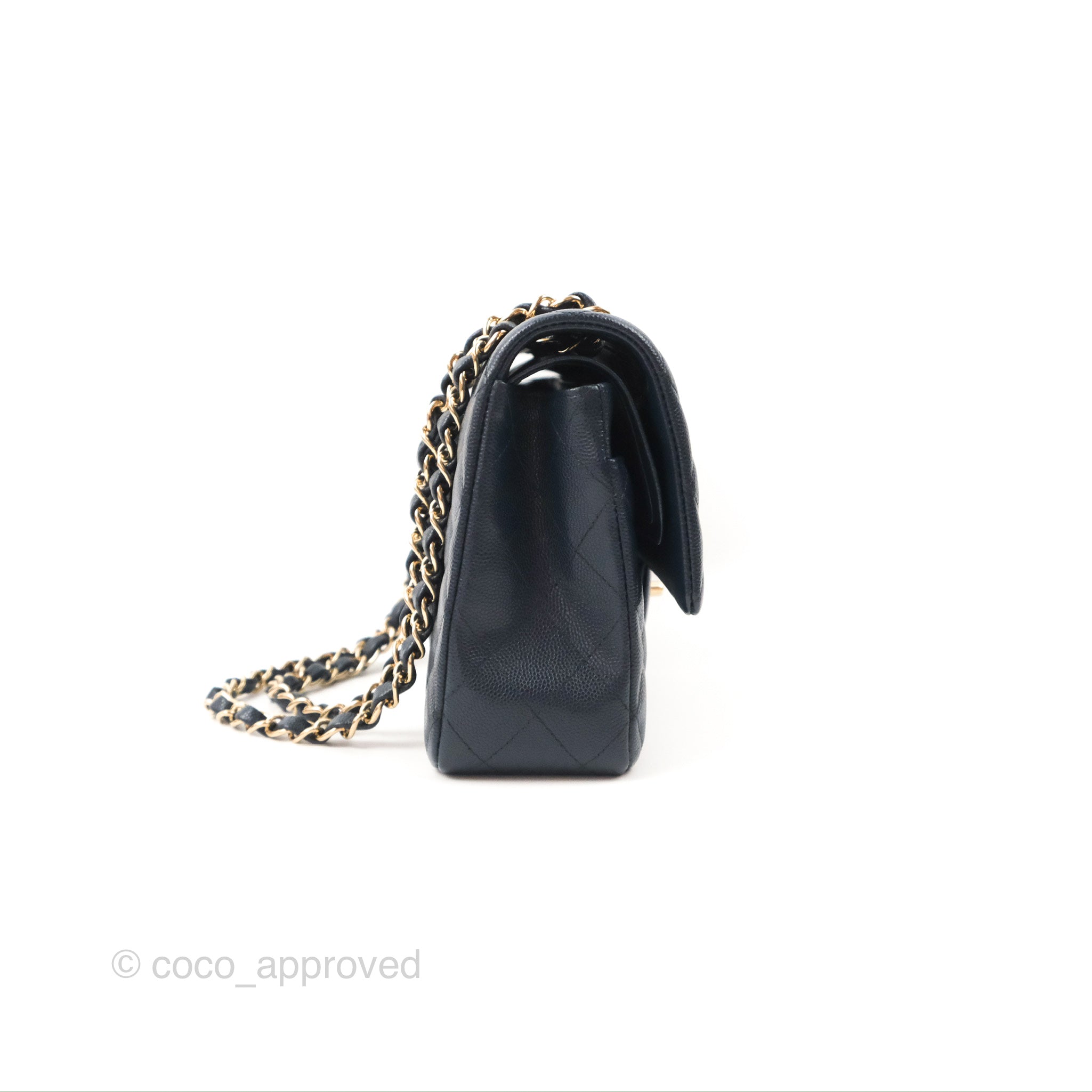 Sold at Auction: Chanel Marine Patent Leather Jumbo Classic Flap Bag