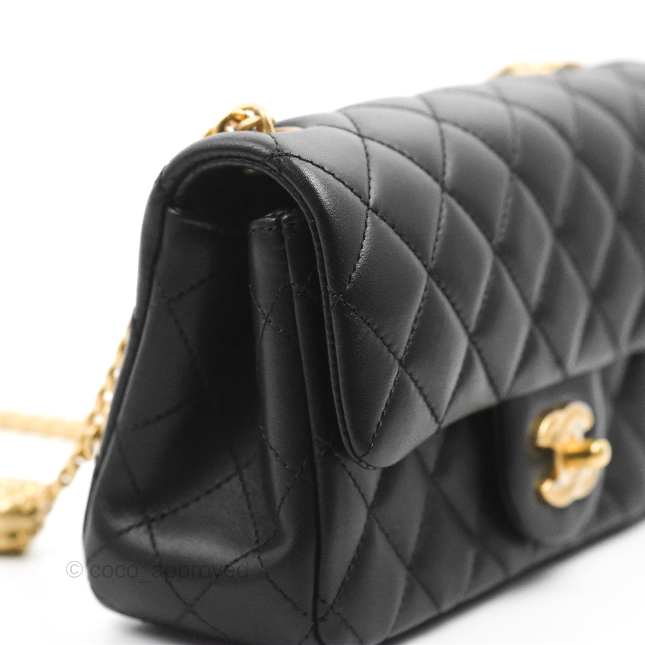 Chanel Black Camellia Embossed Patent Leather Mini Pochette Bag