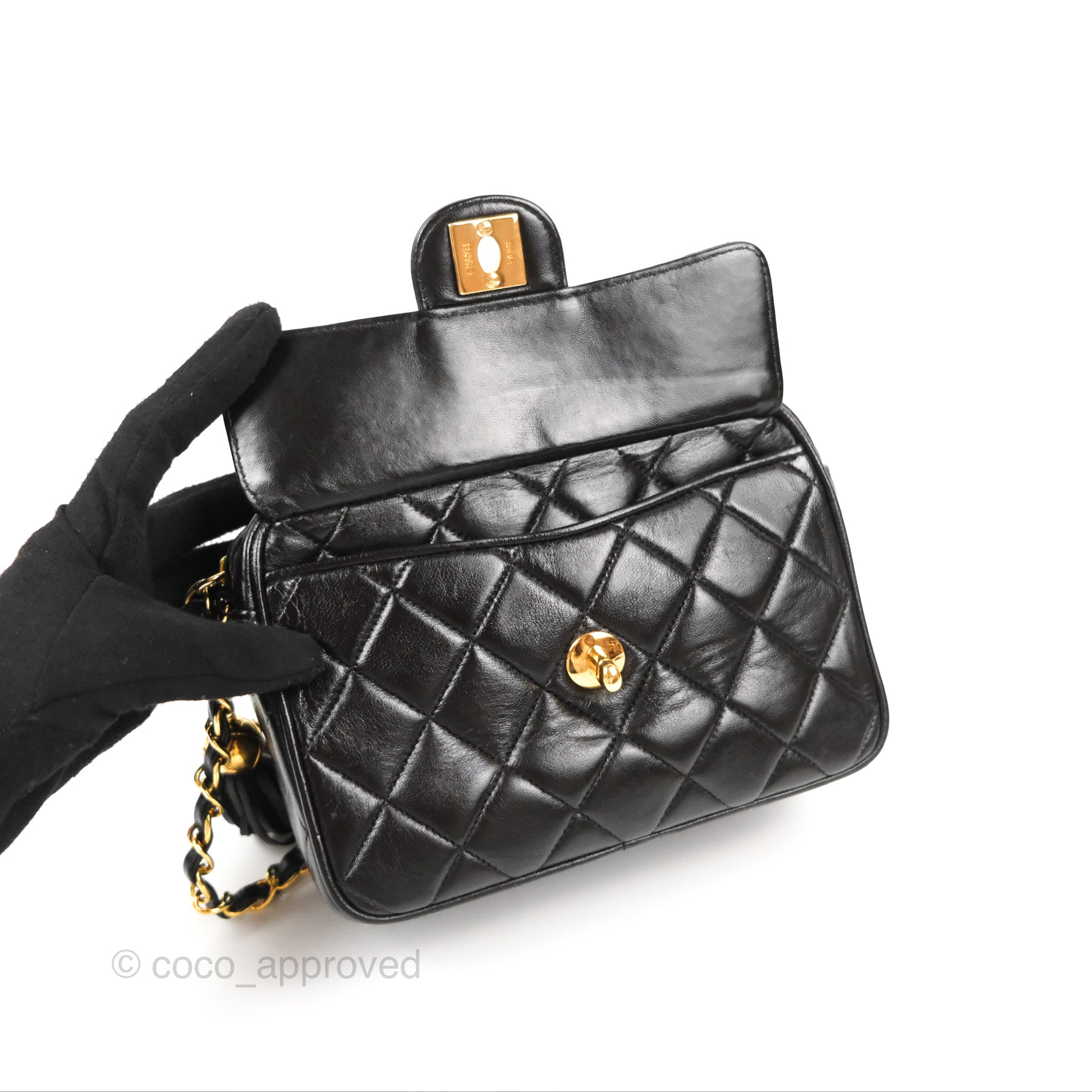CHANEL 1990s Quilted Black Leather Crossbody Bag with Tassel – The