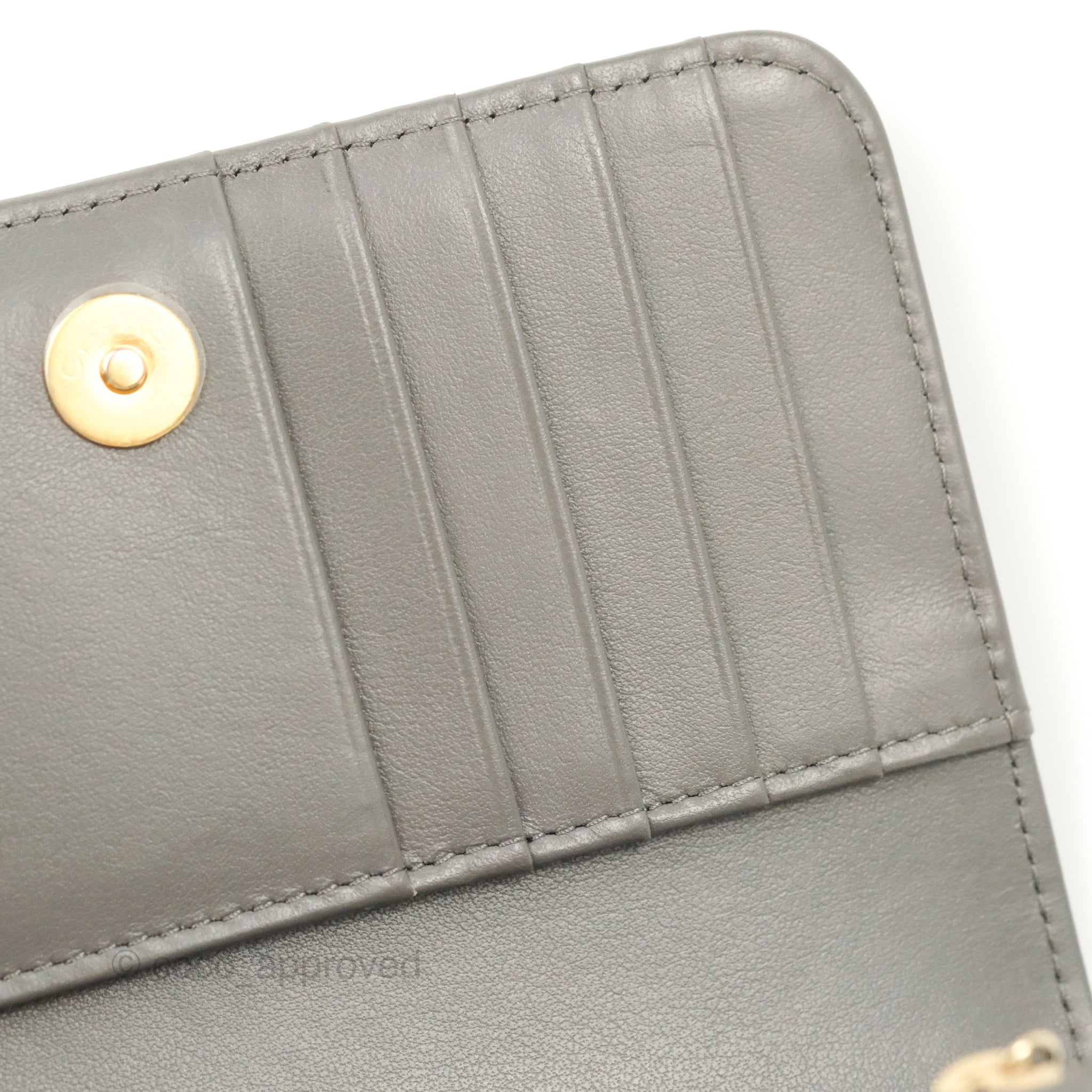 Tons of compartments…Smoke Grey Chanel Wallet from 2005 $2