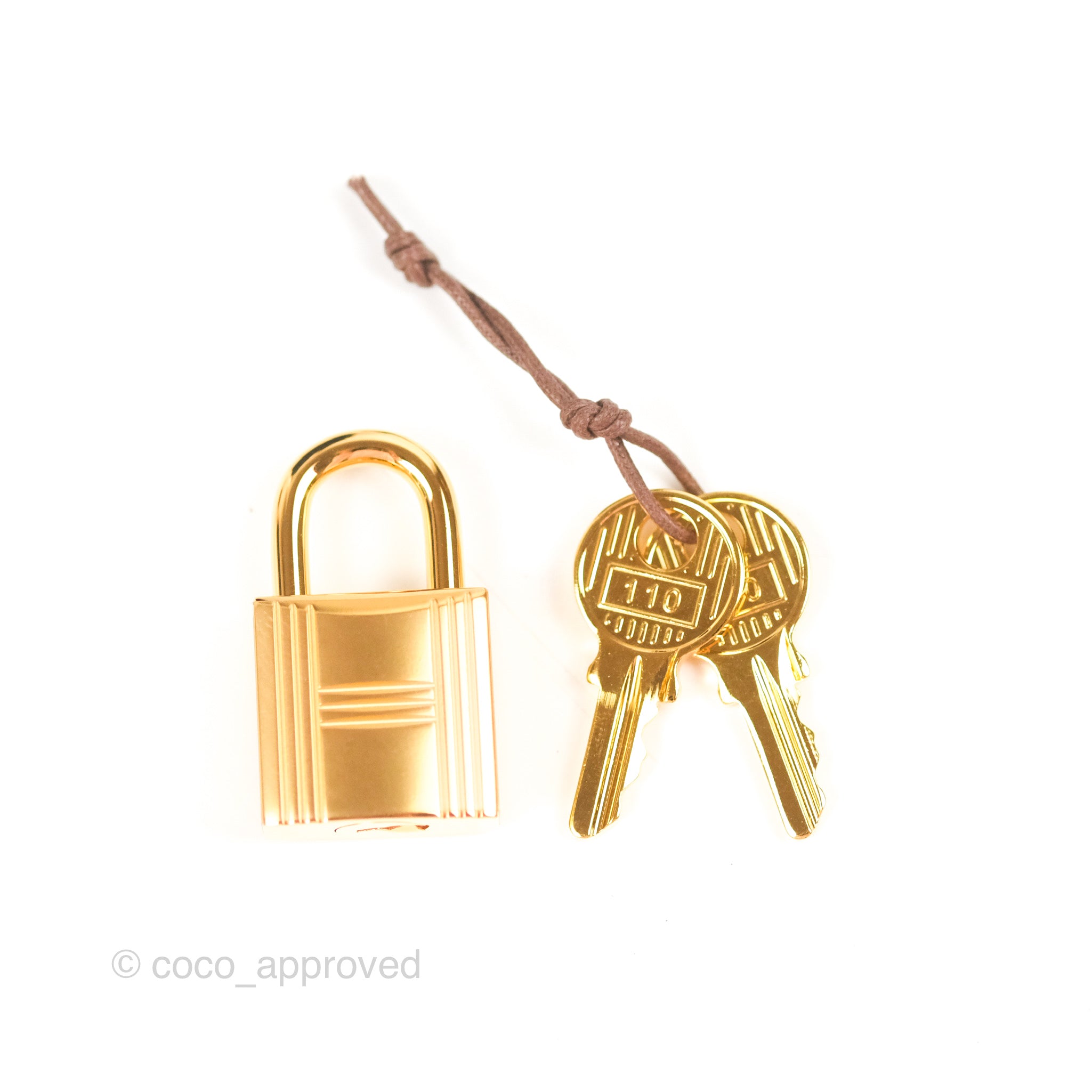 Hermes lock and key gold hardware