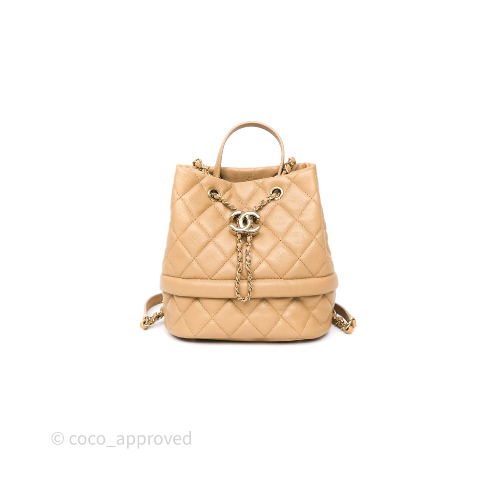 Chanel Rolled Up Bucket Drawstring Bag Beige Caviar Gold Hardware