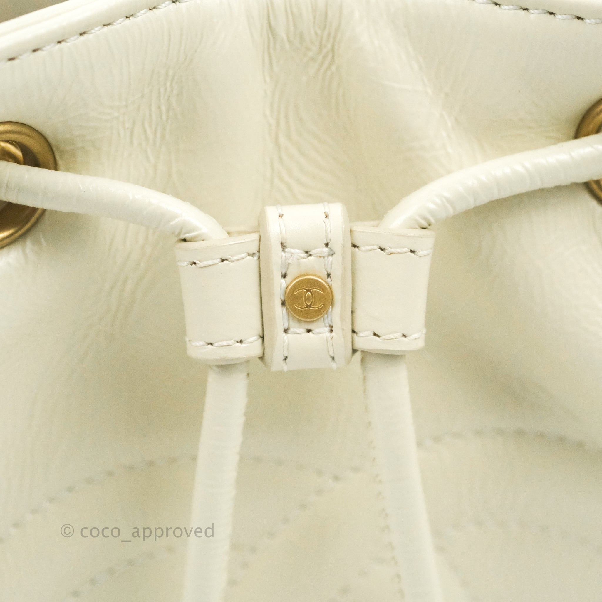 Chanel CC Small Drawstring Bucket Bag White Calfskin Aged Gold Hardwar –  Coco Approved Studio