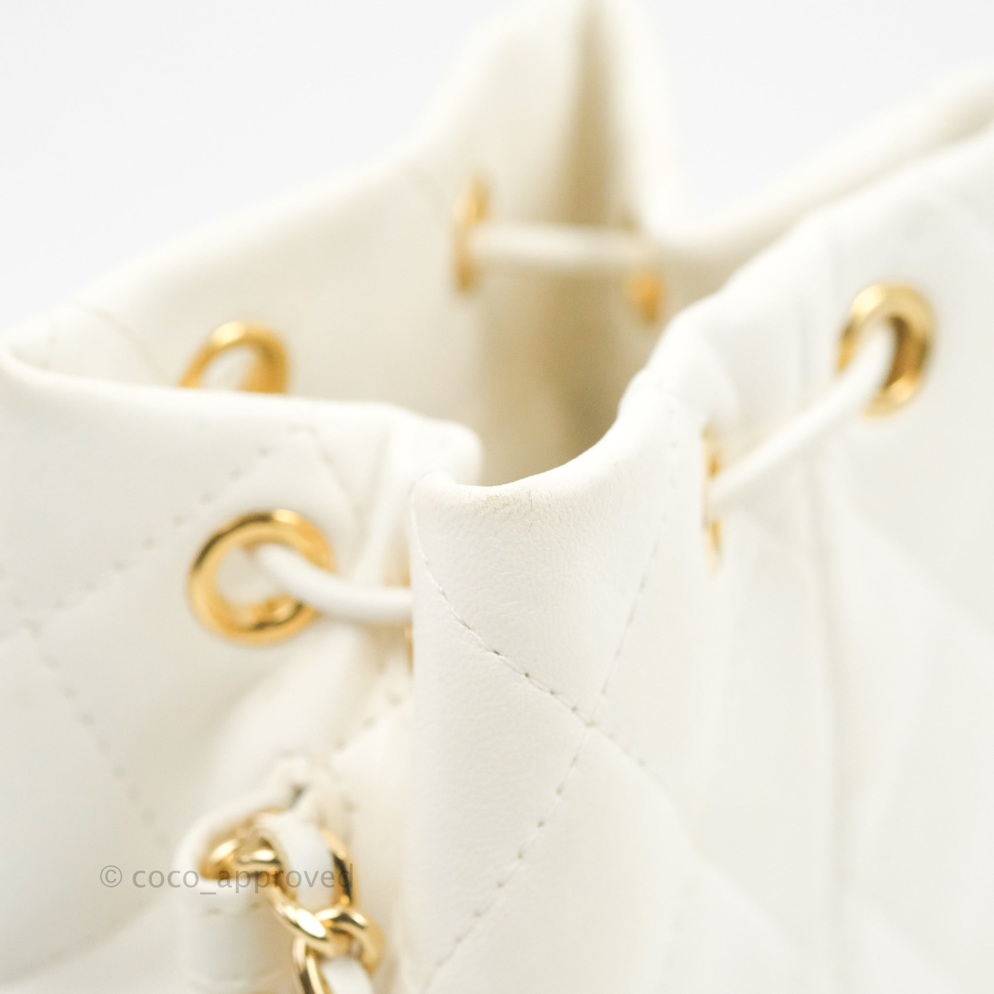 Chanel Quilted Small Drawstring Bucket Bag White Calfskin Gold Hardware