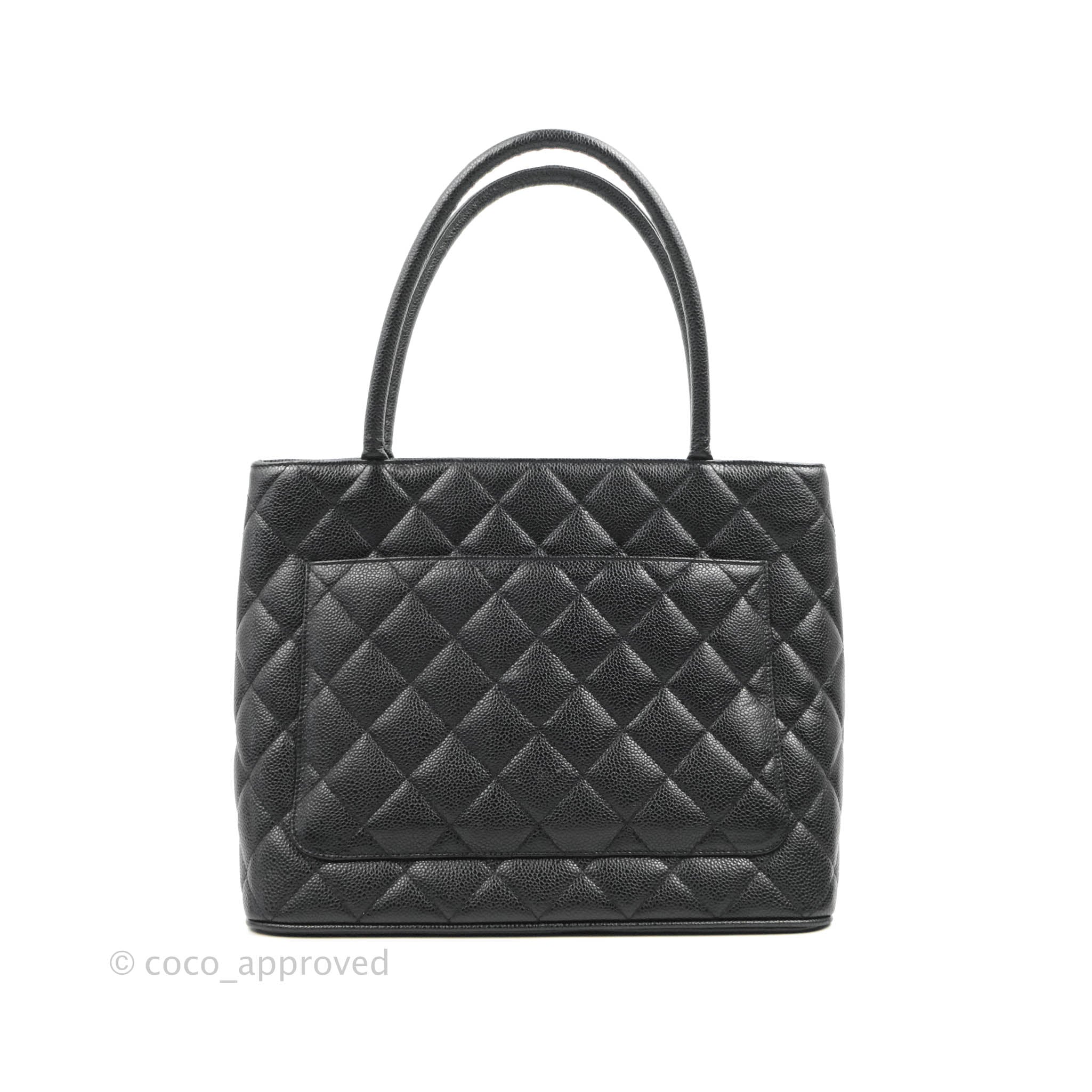 Sold at Auction: A Chanel quilted black satin evening bag, 2000-2002