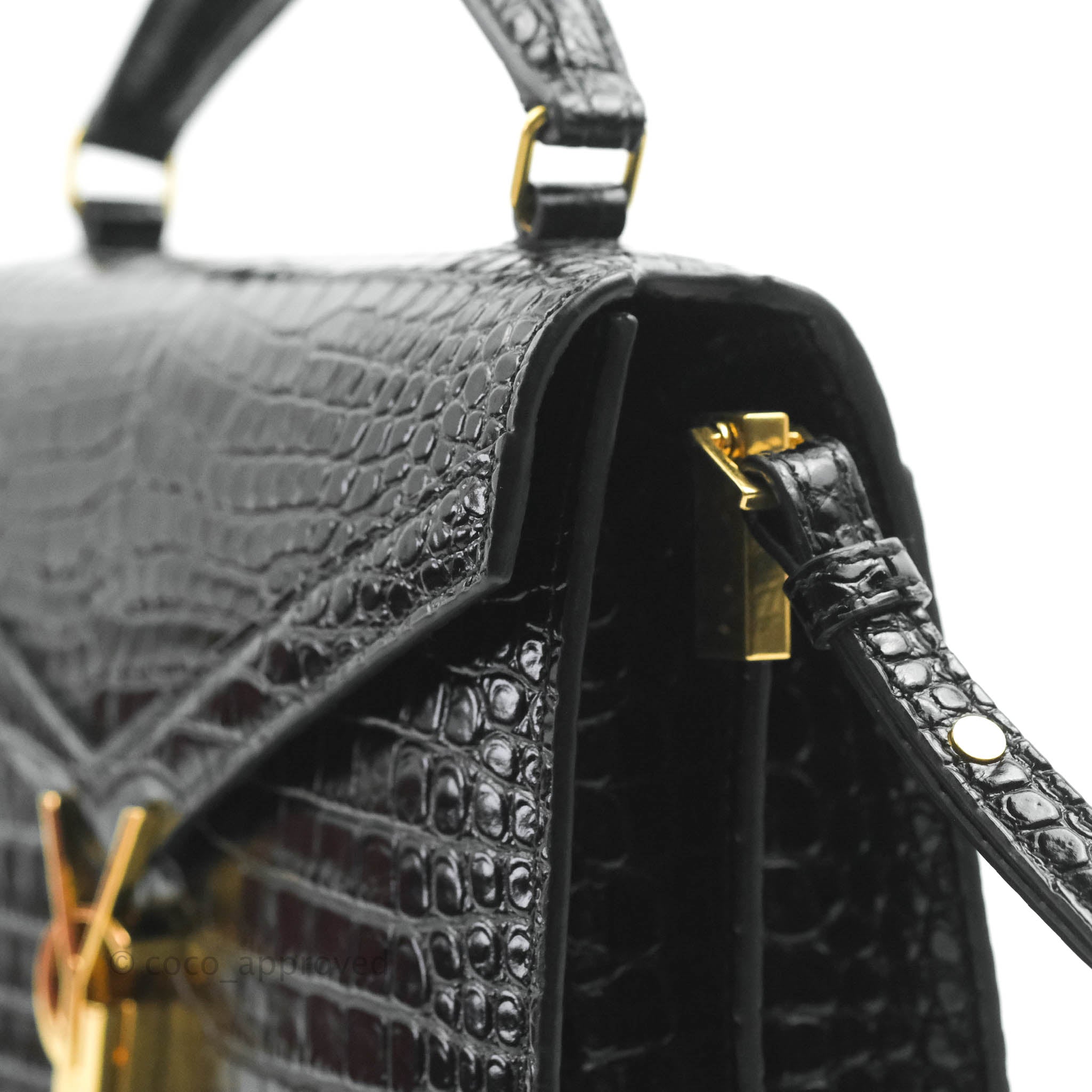 CASSANDRA Mini top handle bag in crocodile-embossed shiny leather