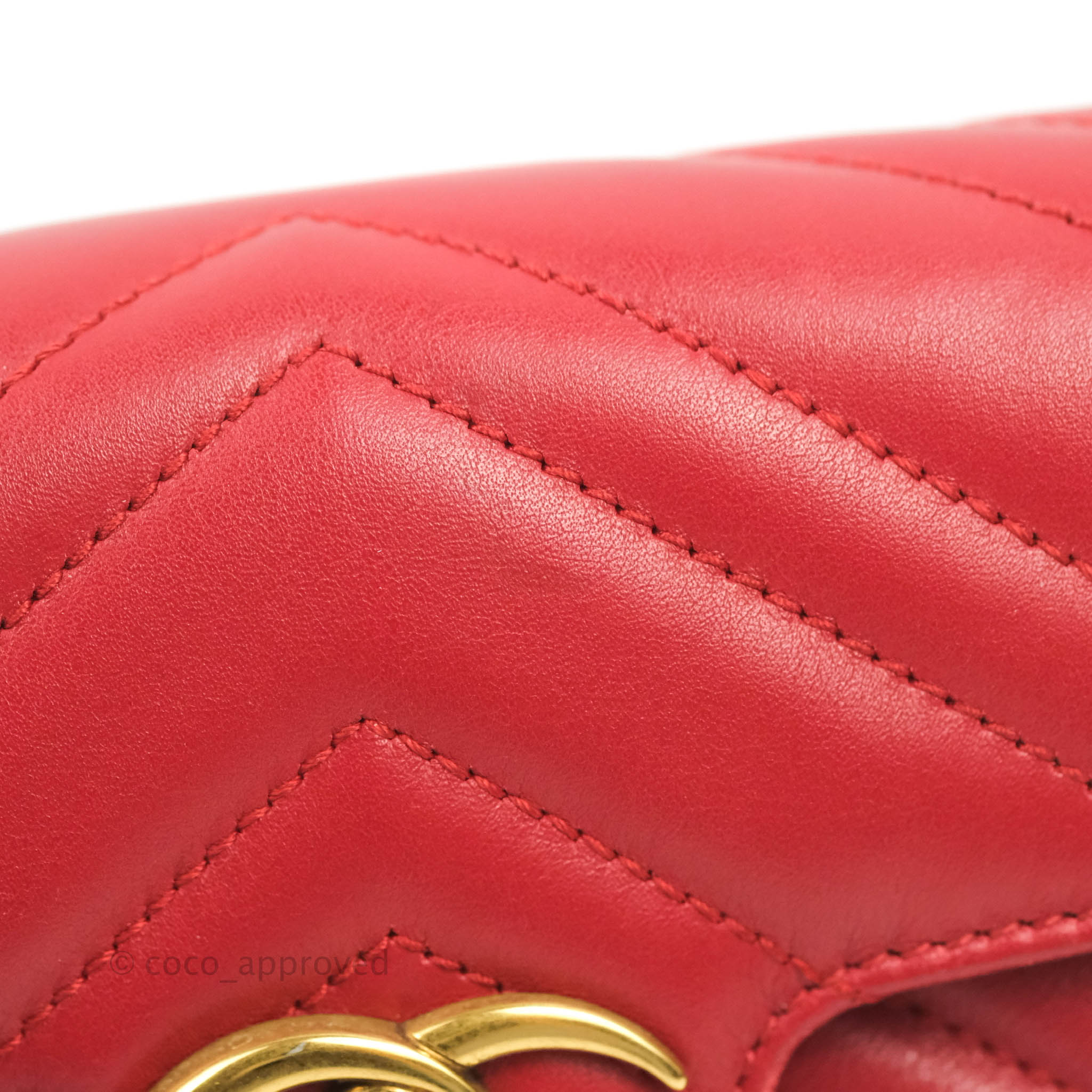 GG Marmont matelassé chain mini bag in red leather