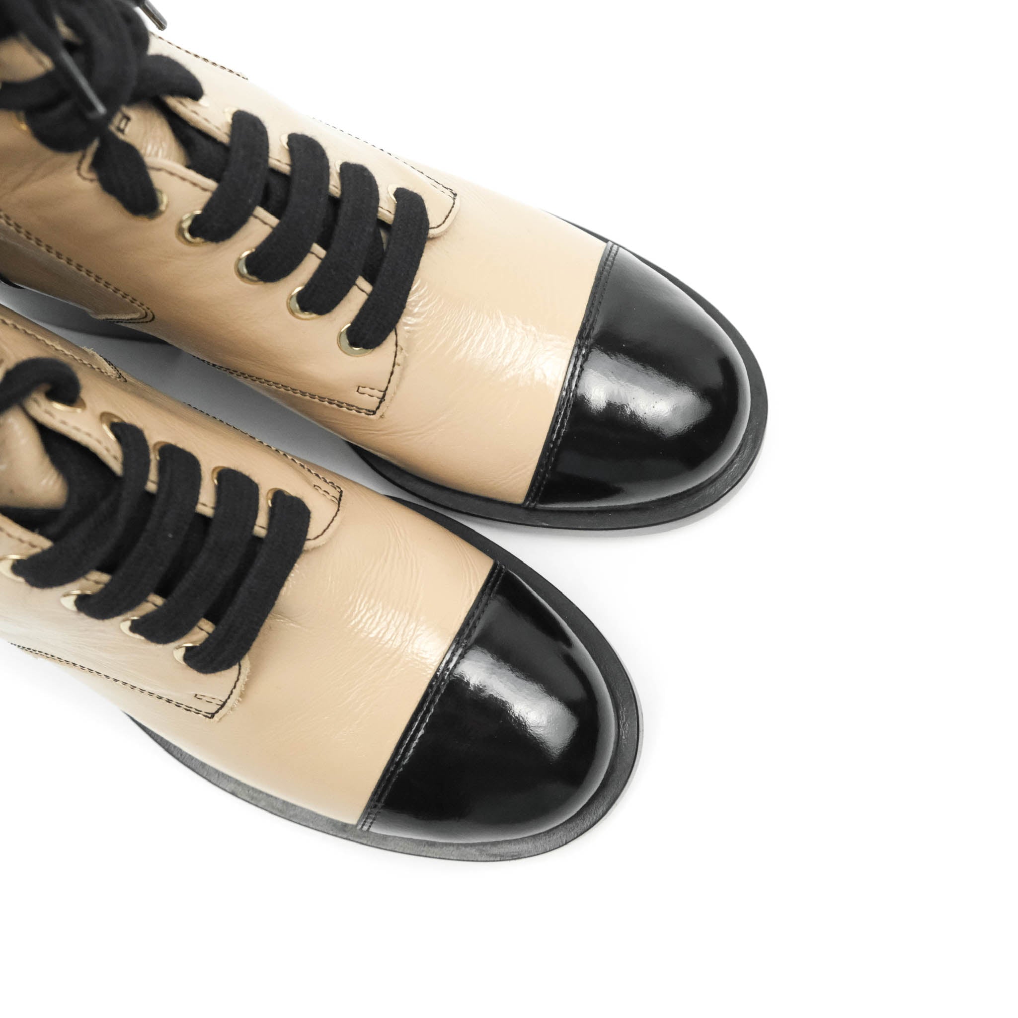 Chanel 2015 Interlocking CC Logo Ankle Boots in Black Patent Leather  ref.951916 - Joli Closet