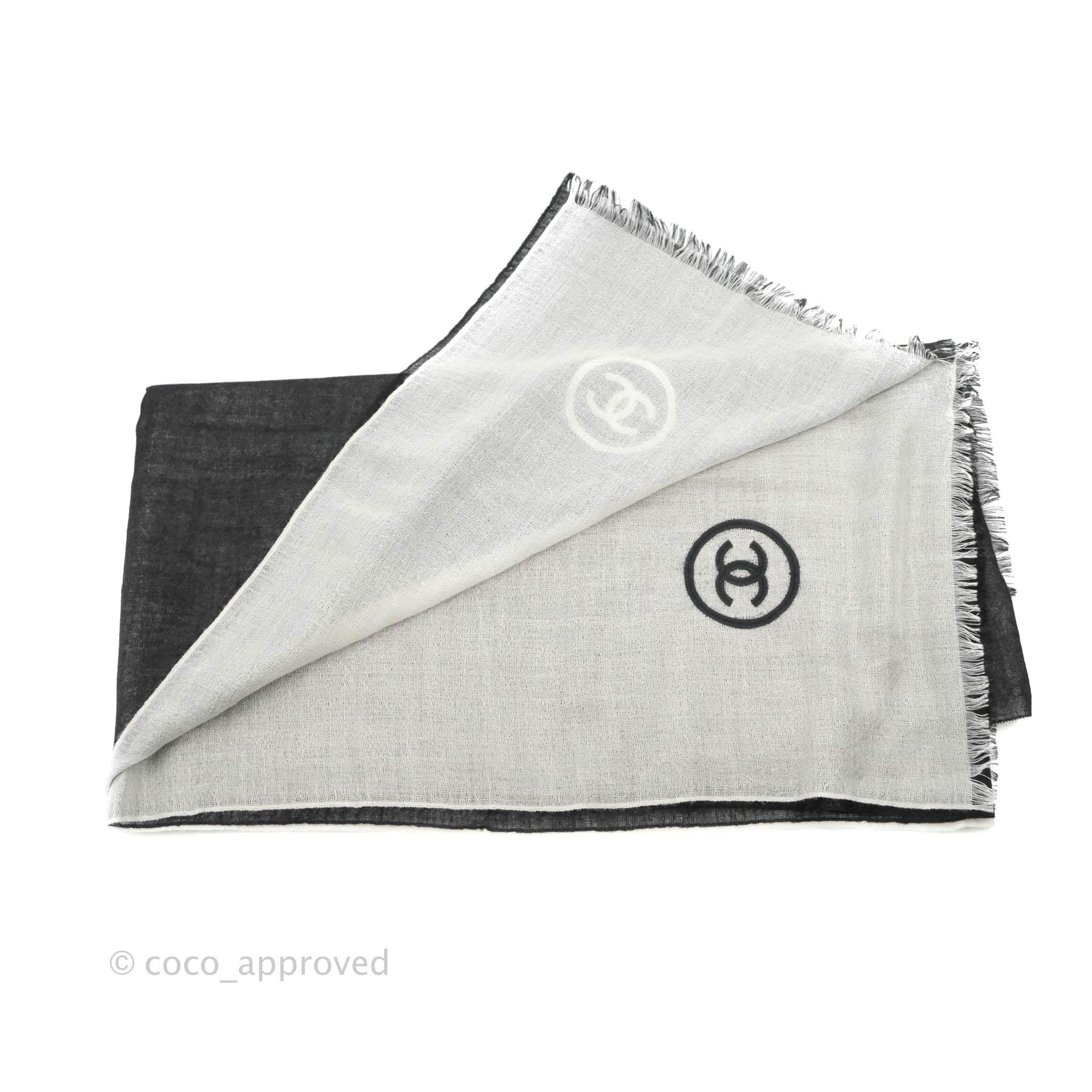 Chanel A Small Silk Scarf. A Black Scarf With A White