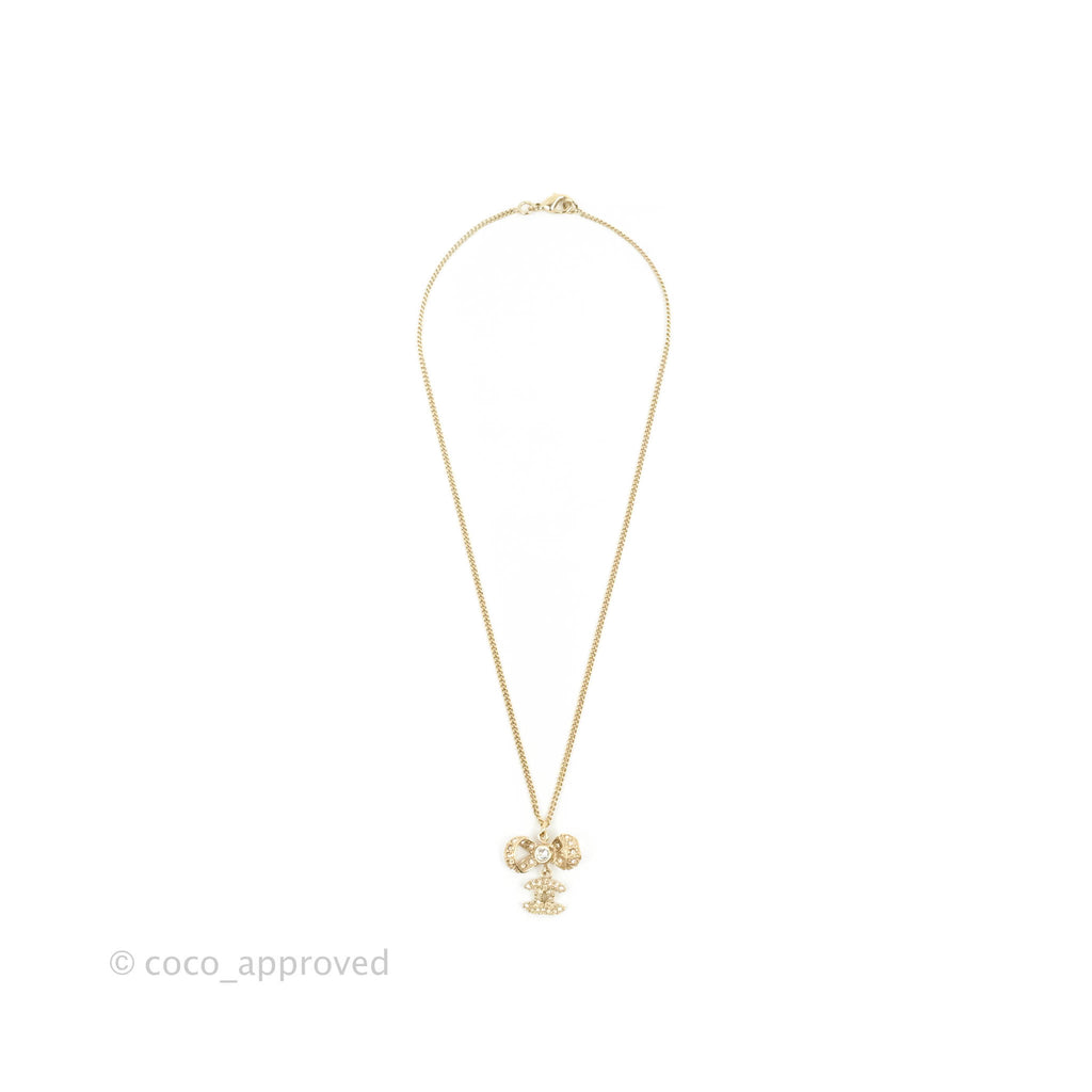 Chanel Ribbon Bow CC Crystal Drop Pendant Necklace Gold Tone 14K