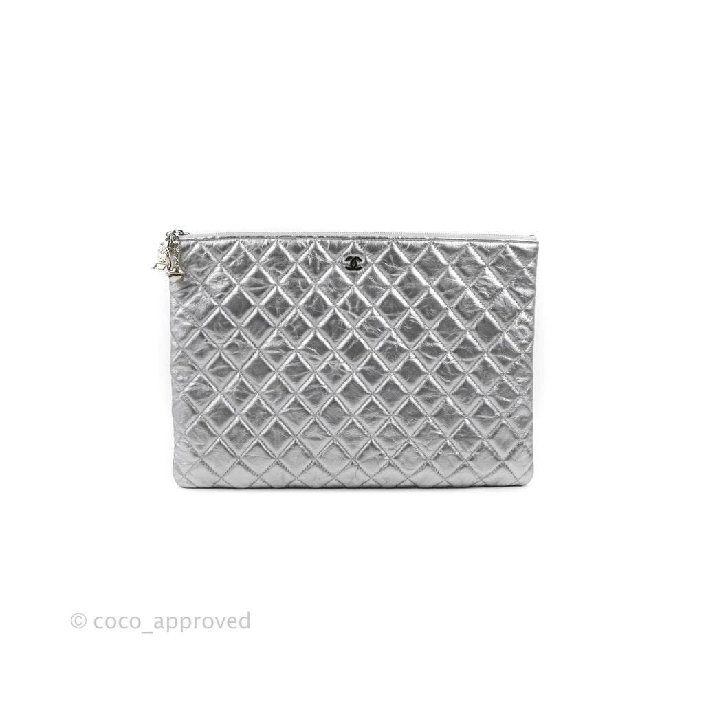 Chanel Quilted Large O Case Metallic Silver With Charms