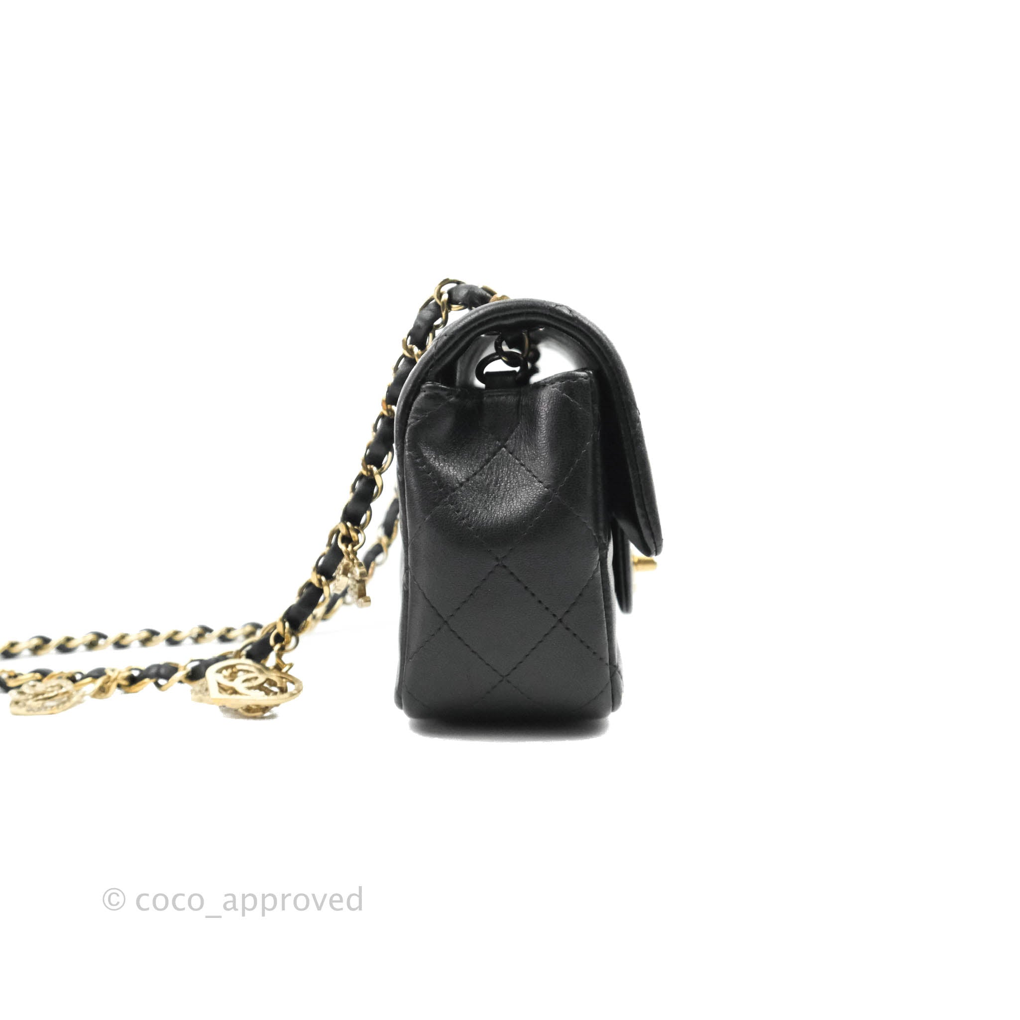 black and gold chanel purse