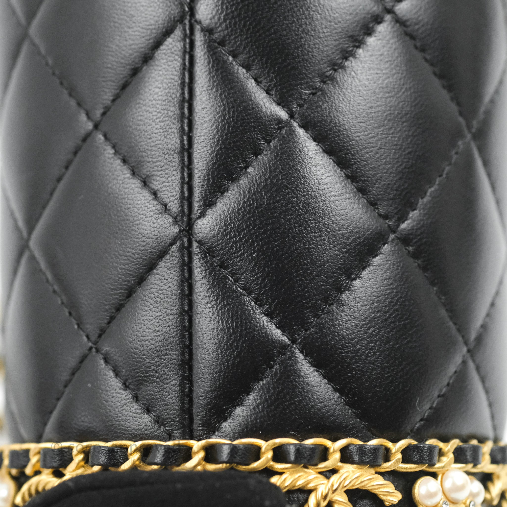 Chanel Quilted Drawstring Pearl Flower Bucket Bag Black Lambskin Aged – Coco  Approved Studio