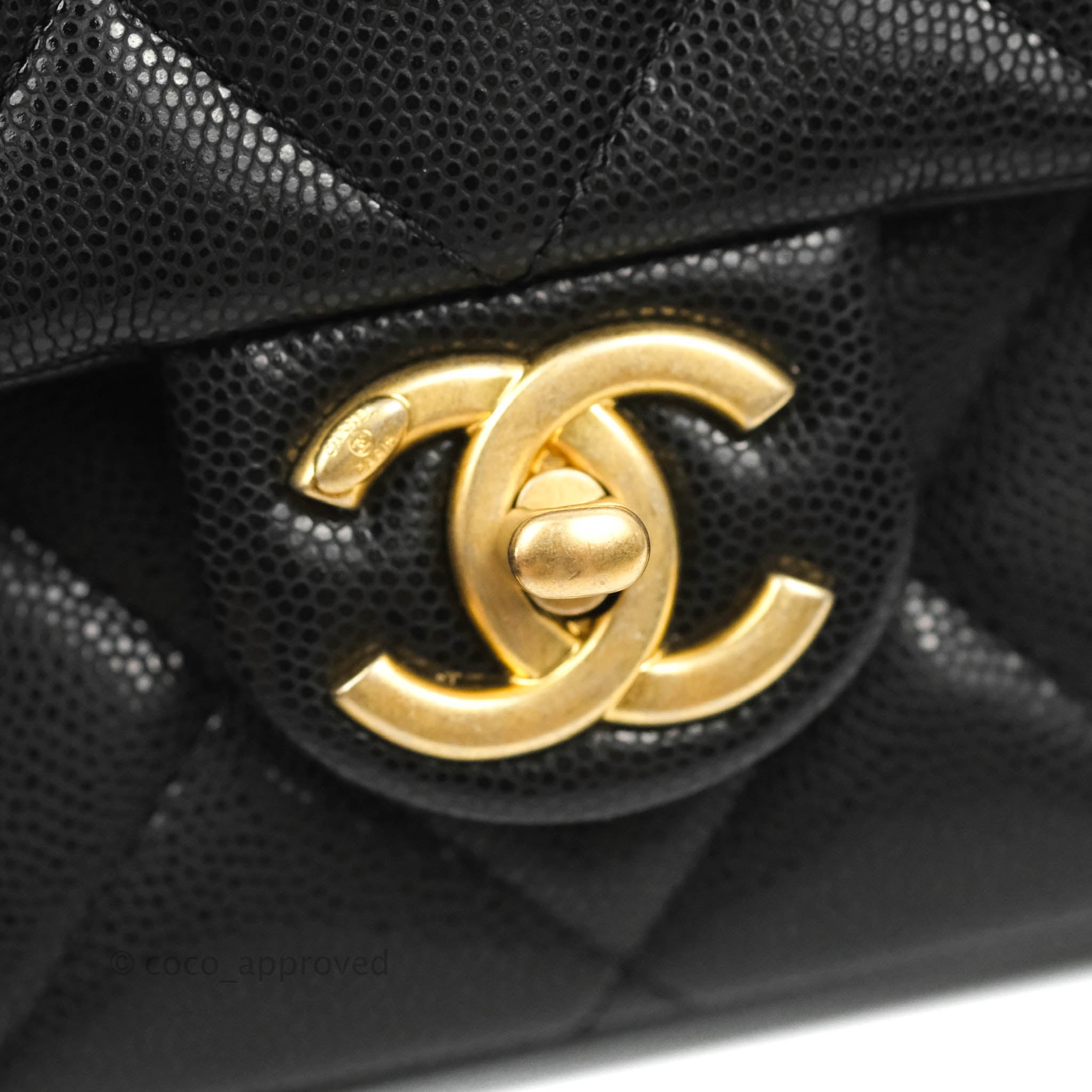 gold and black chanel bag caviar