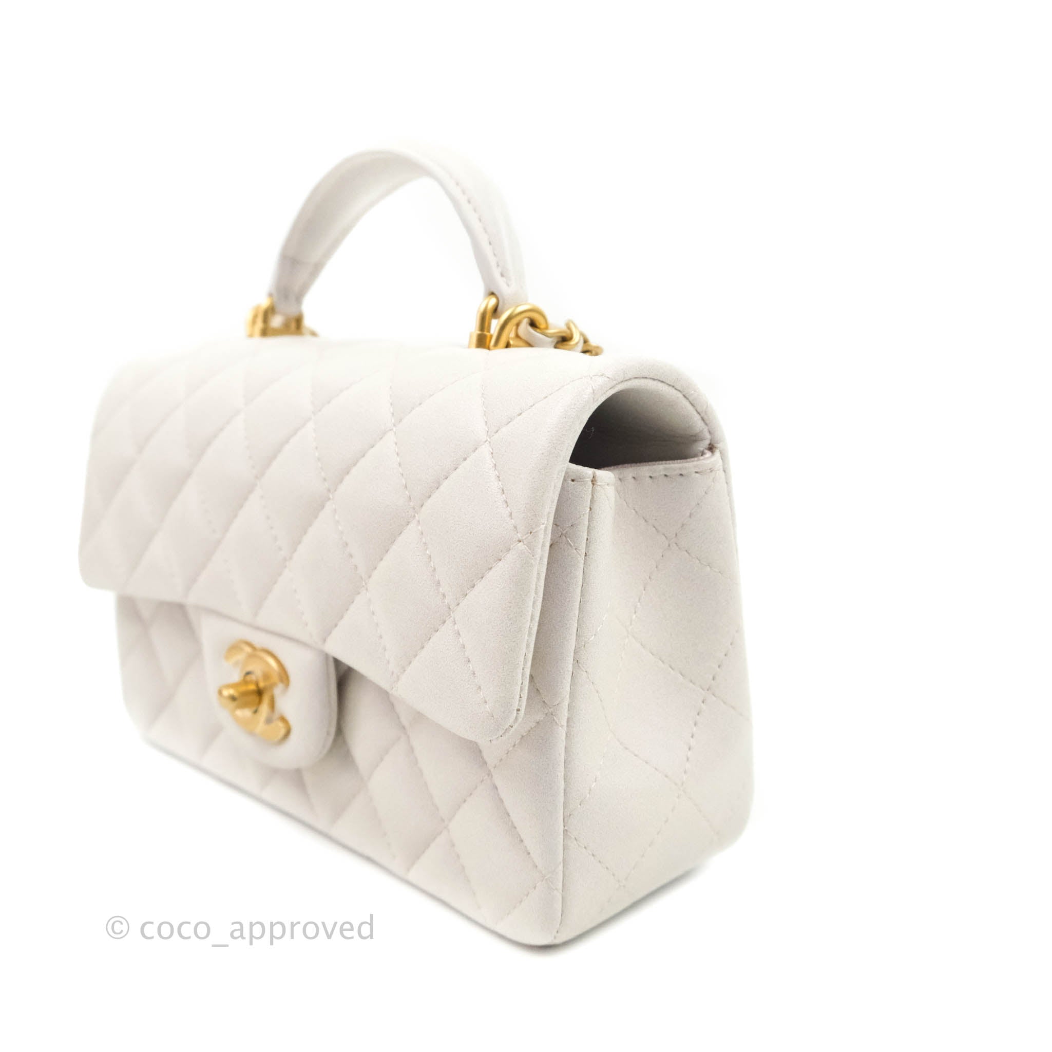 white chanel bag with handle