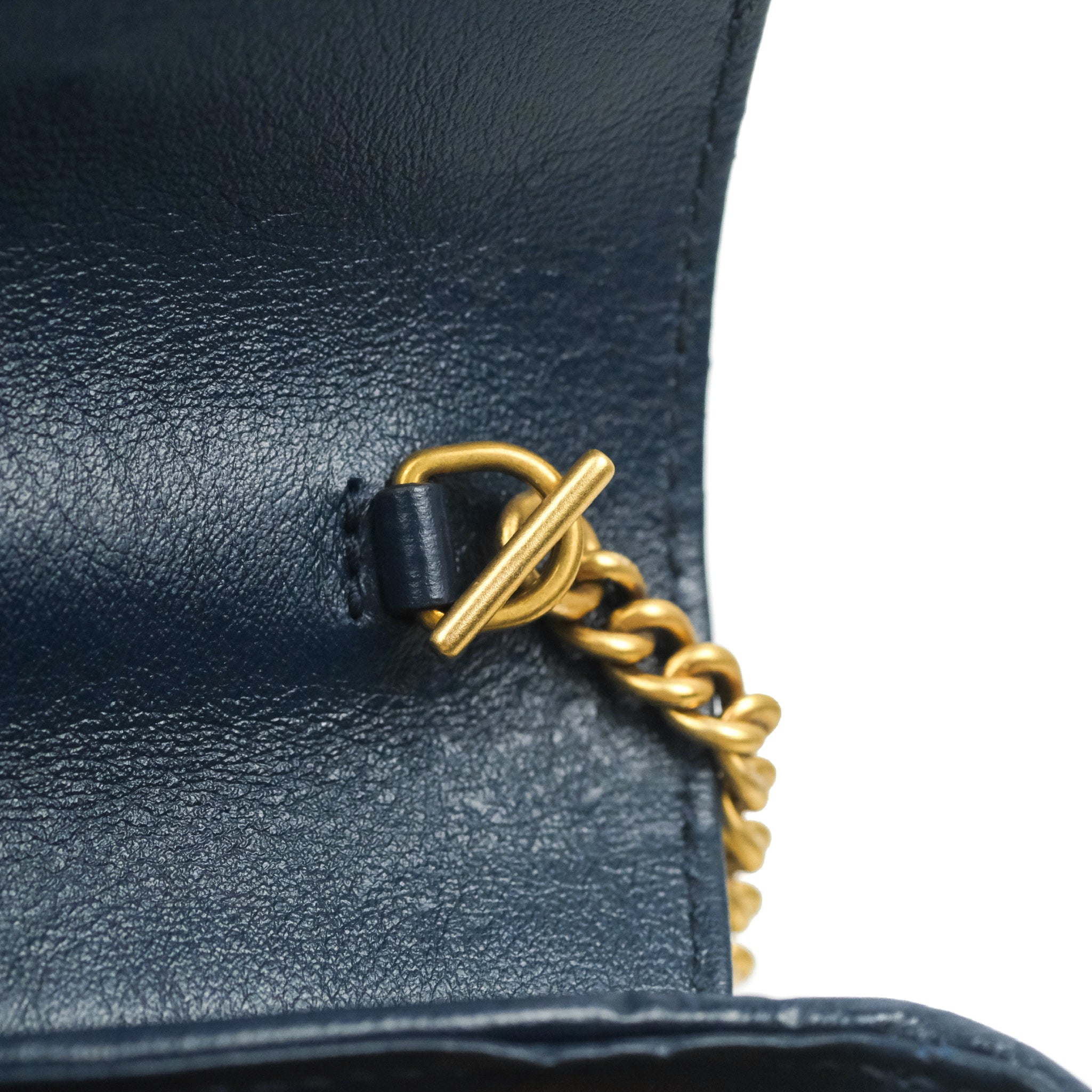 GG Marmont matelassé chain mini bag in white leather