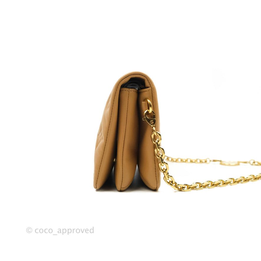 Louis Vuitton Pochette Coussin Monogram Caramel Beige Gold