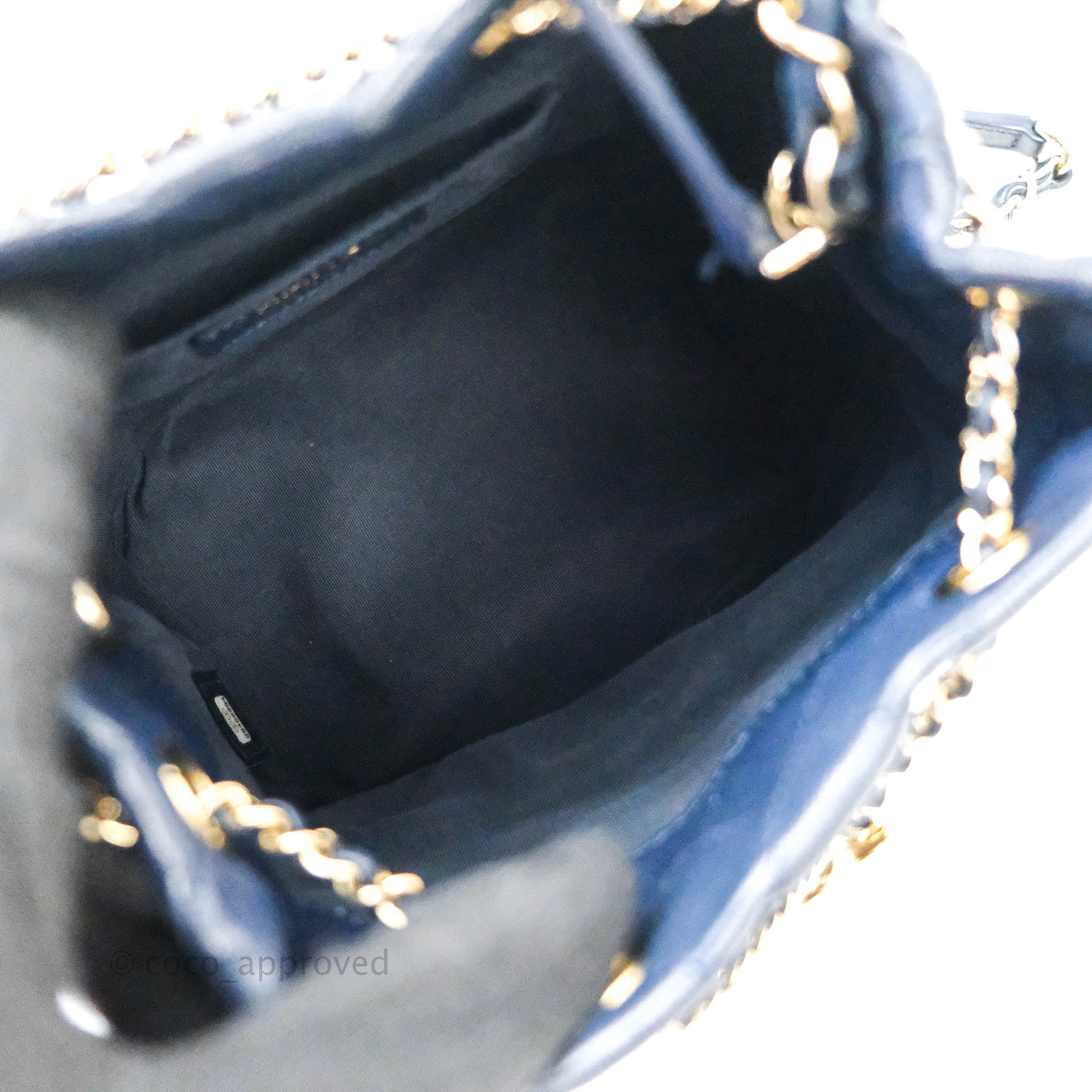 Chanel Caviar Quilted Rolled Up Bucket Drawstring Bag Navy Gold