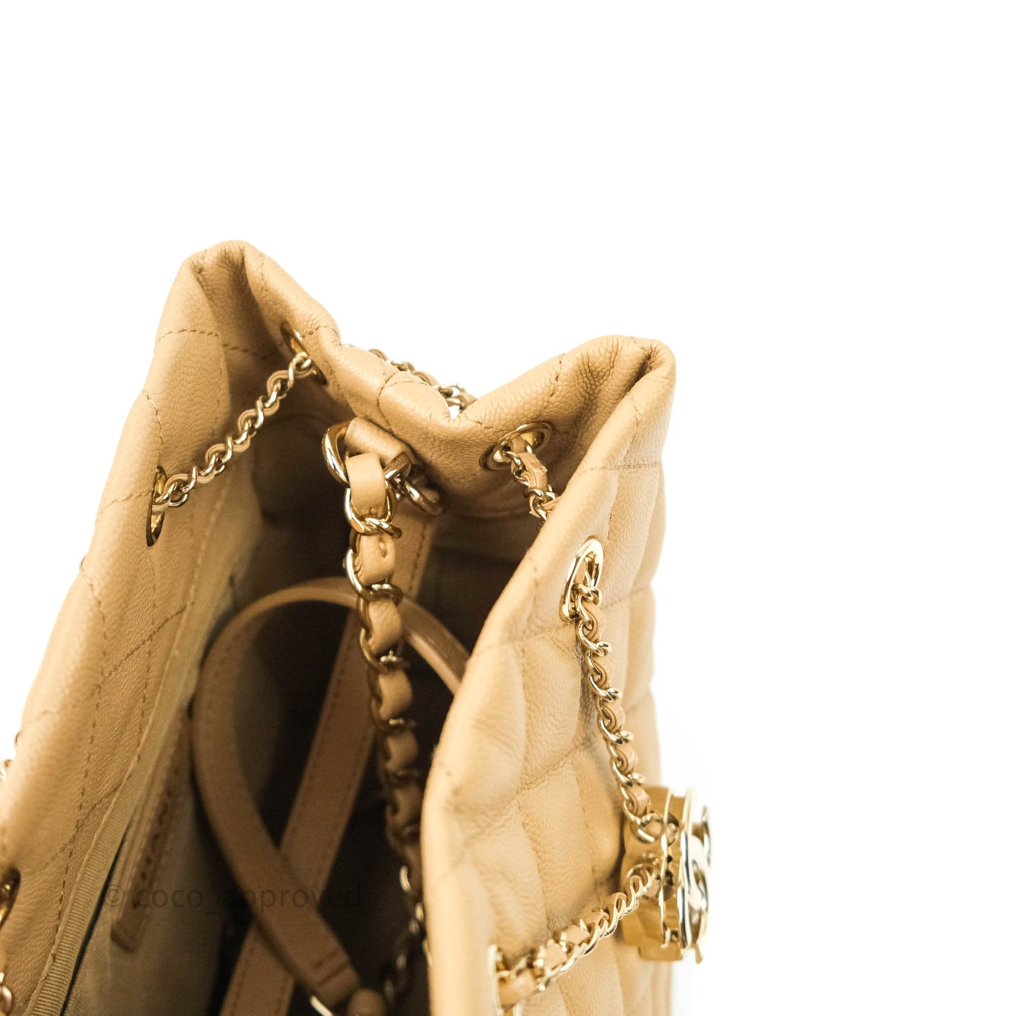 Chanel Caviar Quilted Rolled Up Bucket Drawstring Bag Beige Gold