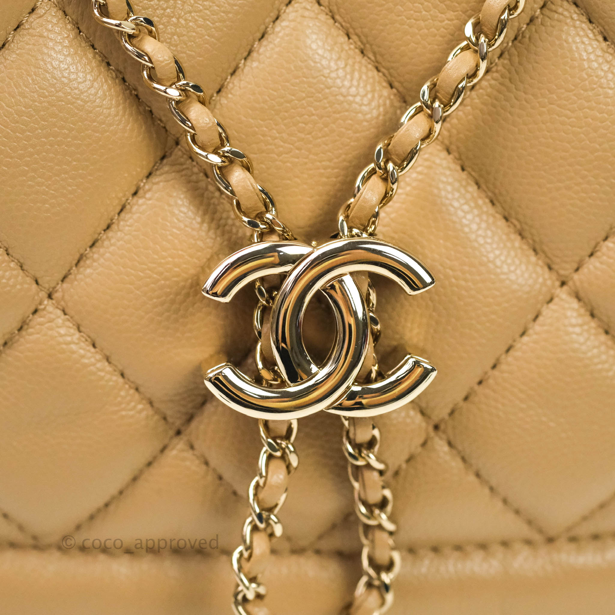 Chanel Caviar Quilted Rolled Up Bucket Drawstring Bag Beige Gold