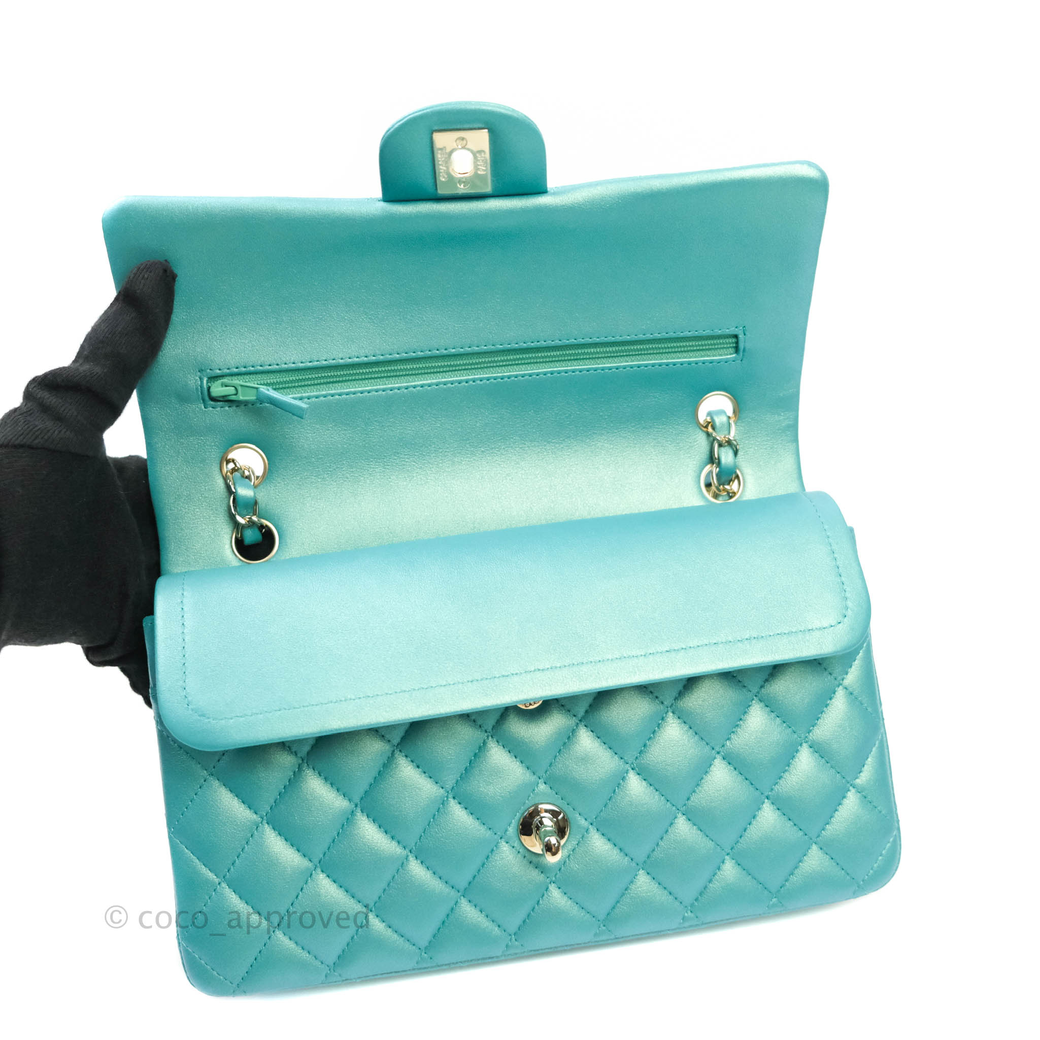 Chanel timeless double flap bag in turquoise Lambskin with gold hardware.