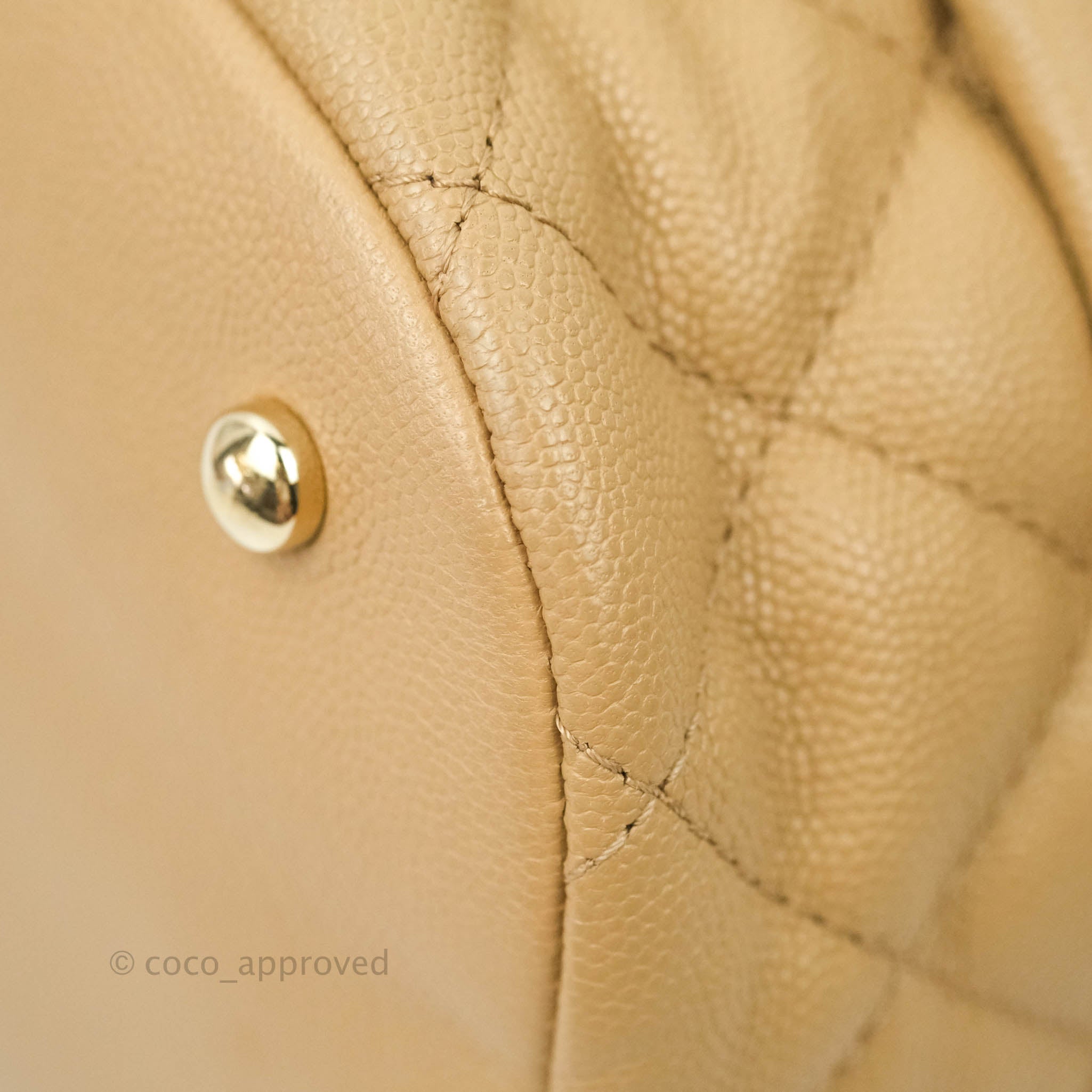 Chanel Caviar Quilted Rolled Up Bucket Drawstring Bag Beige Gold