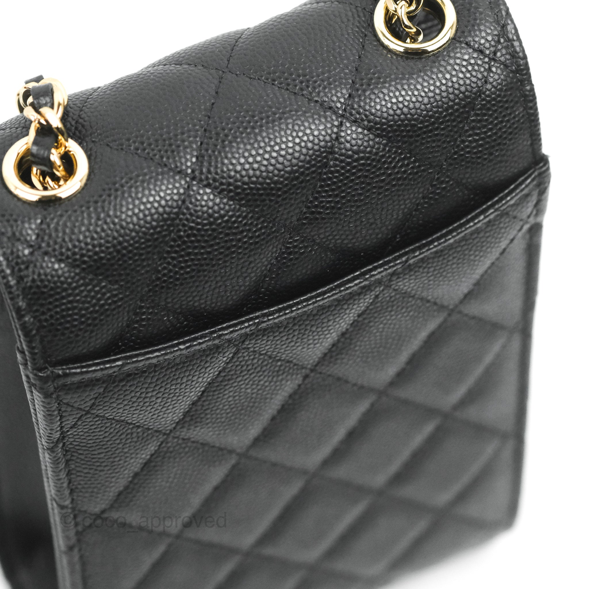 What fits inside the Chanel Classic iPhone Holder in black Caviar