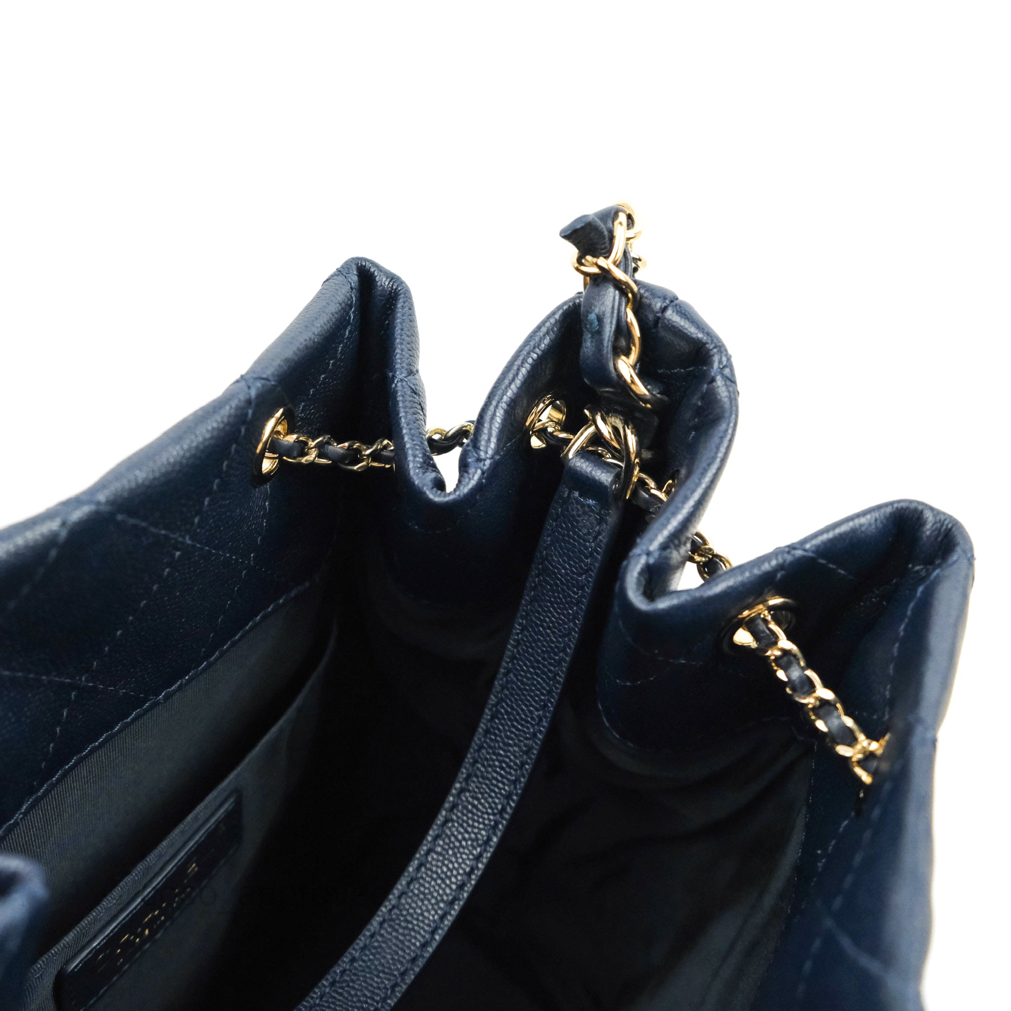 Chanel Medium Quilted Rolled Up Bucket Drawstring Bag Navy Caviar Gold –  Coco Approved Studio