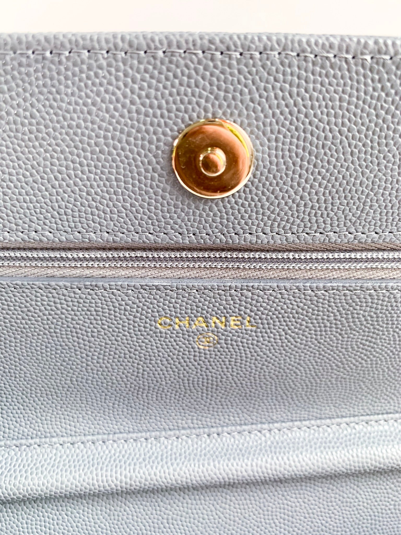 Chanel 22A beige grained calfskin WOC gold hardware