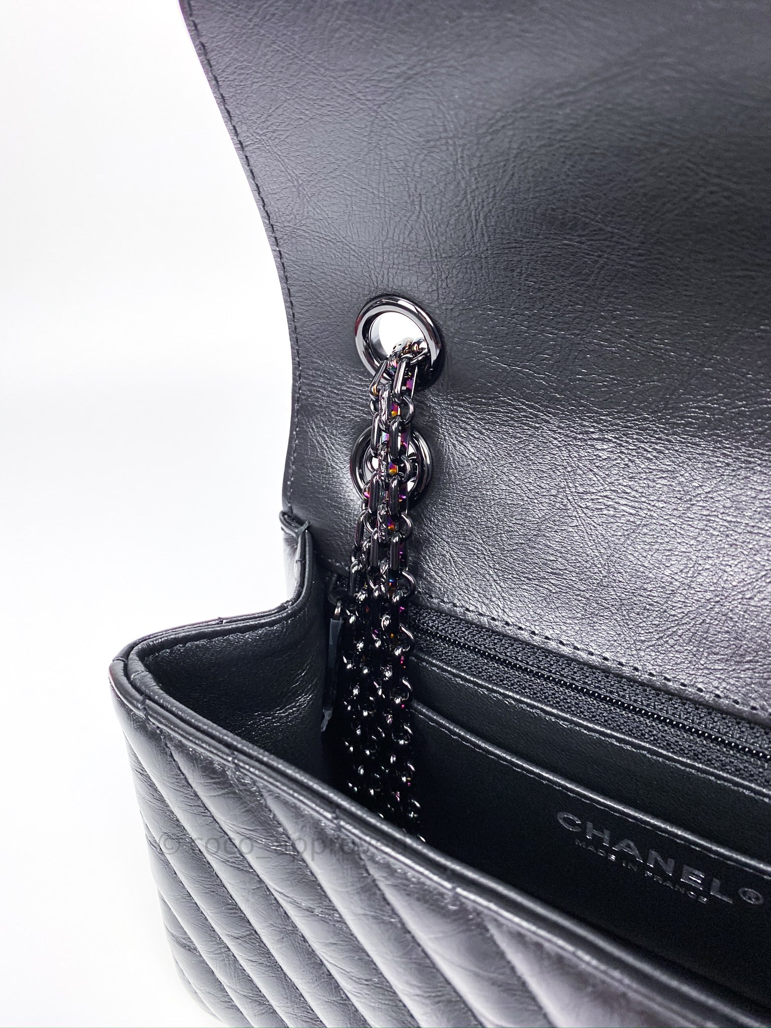 Chanel Chain-Embellished Mini Flap Bag in Black Calfskin — UFO No More