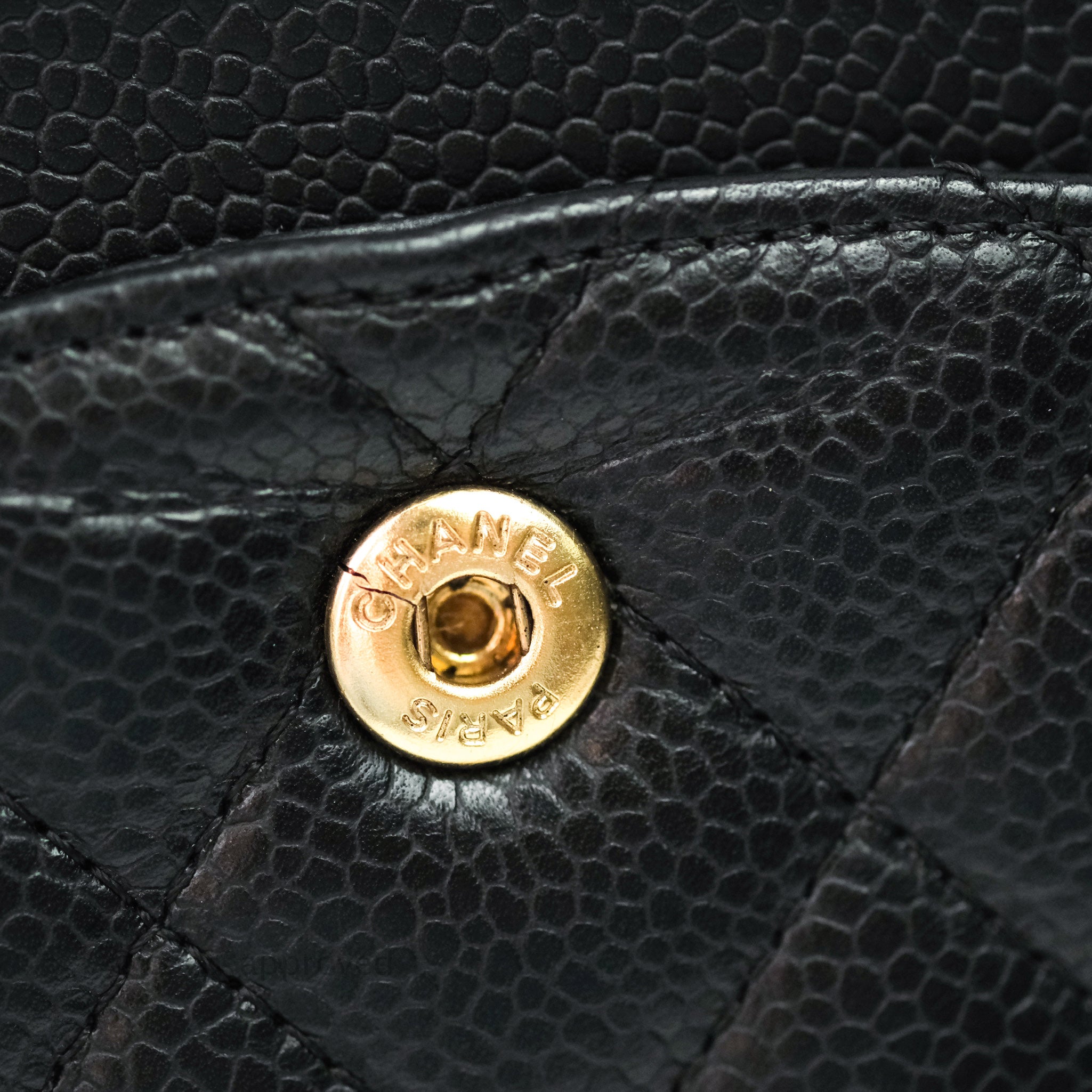 gold and black chanel bag caviar