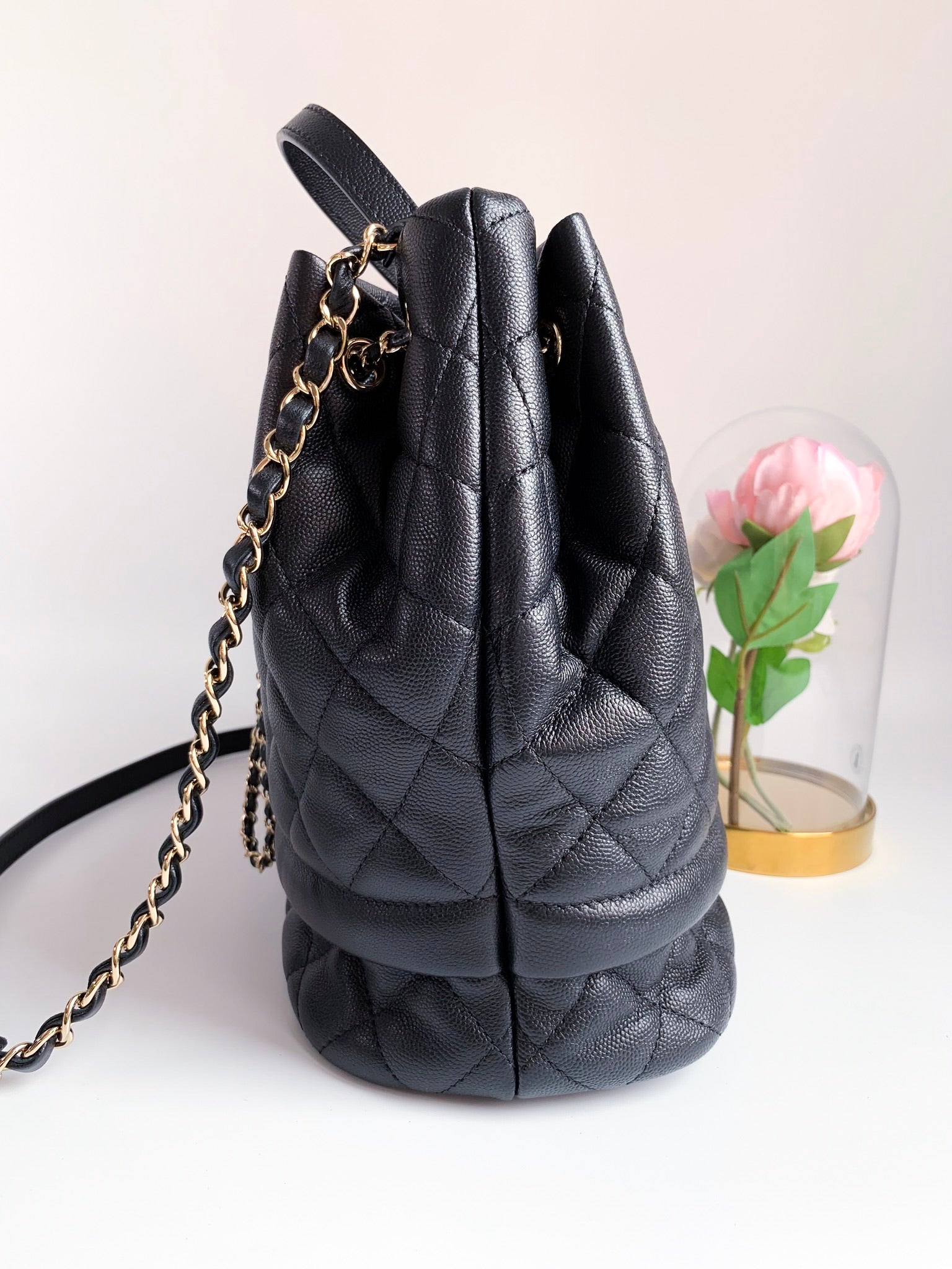 Chanel Caviar Quilted Rolled Up Bucket Drawstring Bag Black Gold